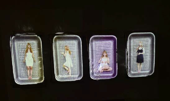 For Sale! / Video Projection on plastic wrap and cardboard