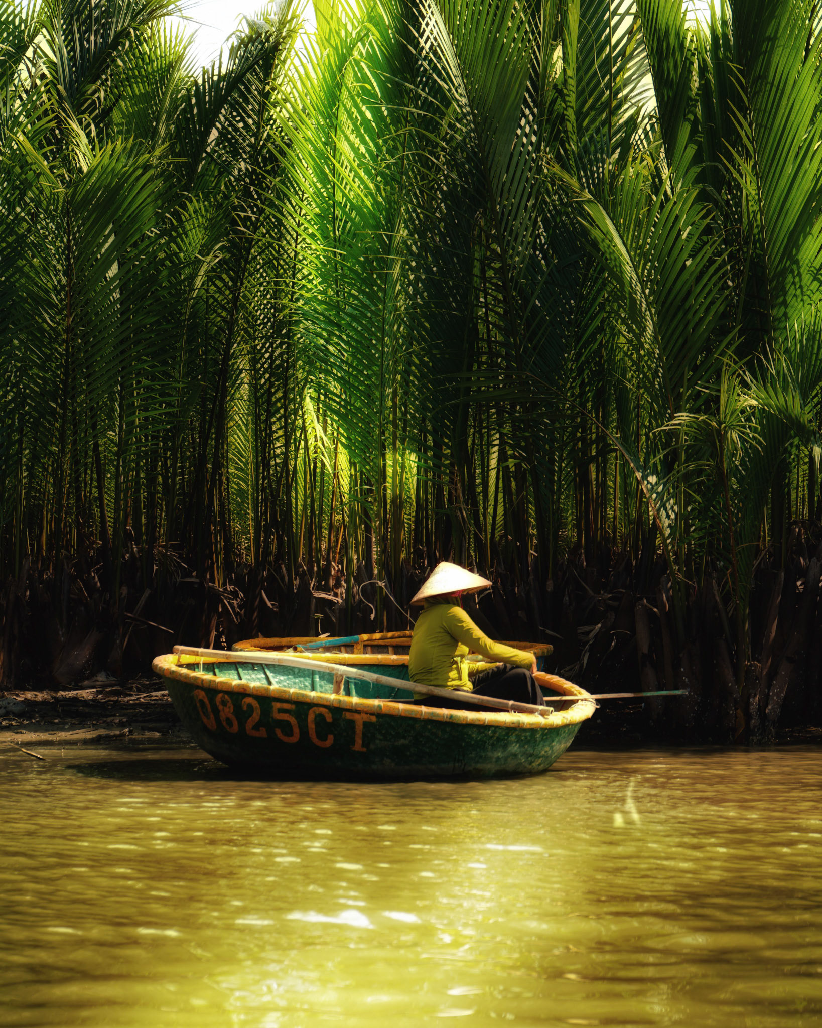 Local Fisherman in a Traditional Coconut Basket Boat