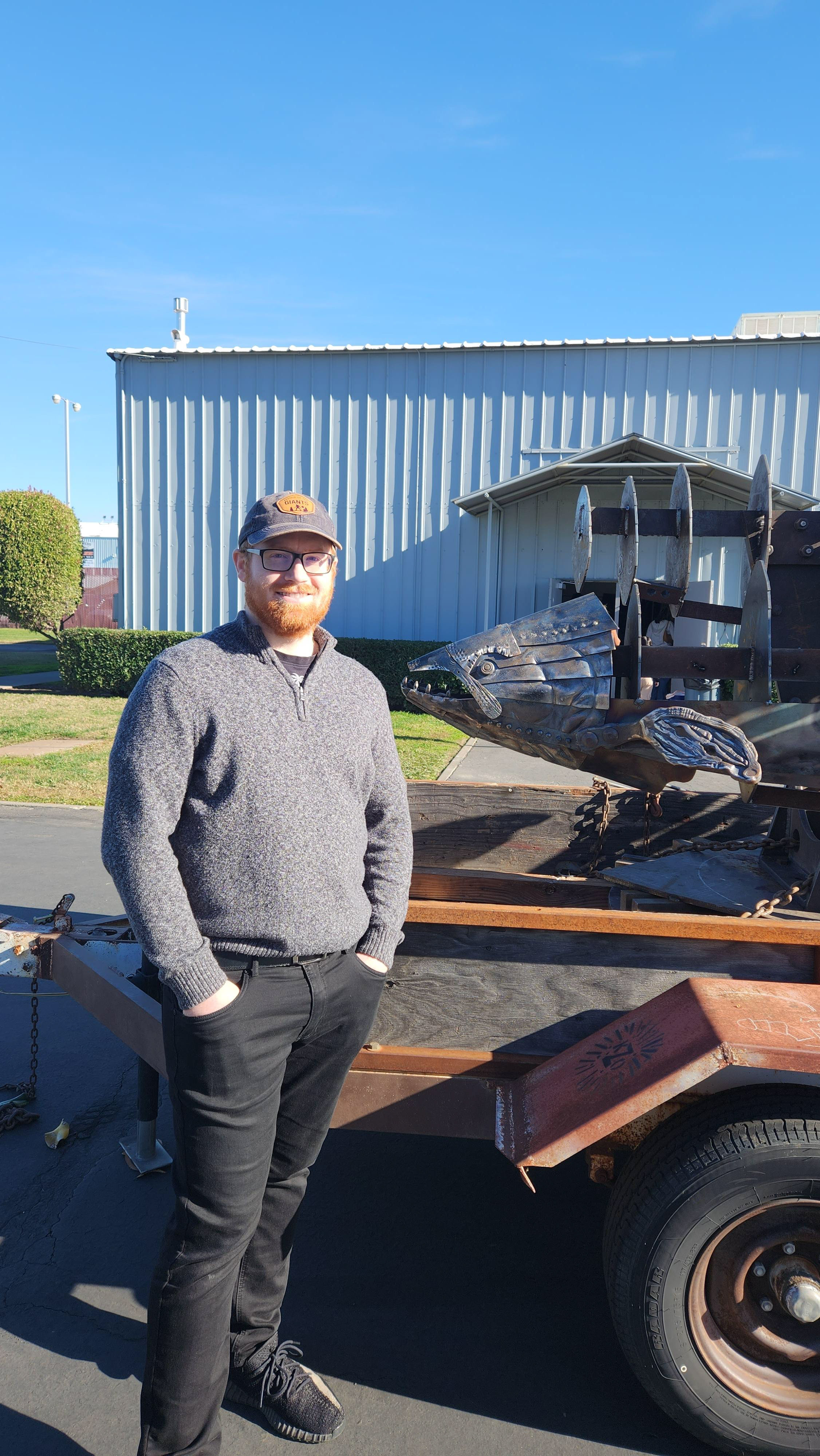 Picture taken of Sculpture at the Fair Grounds in Chico on a Trailer on Display for first public preview, with me in the picture