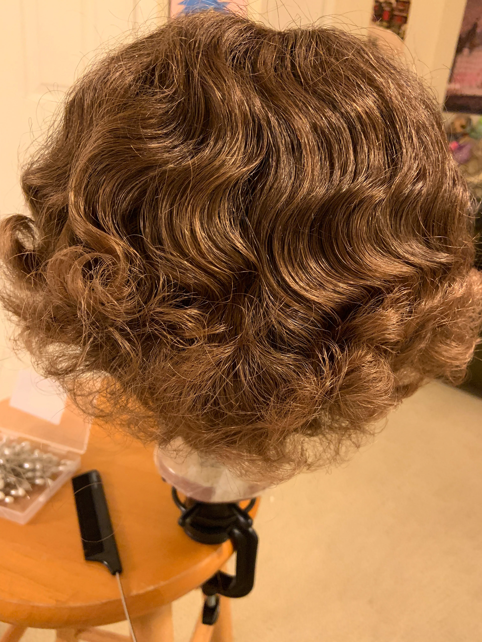 Fingerwaves after roller removal and brush through