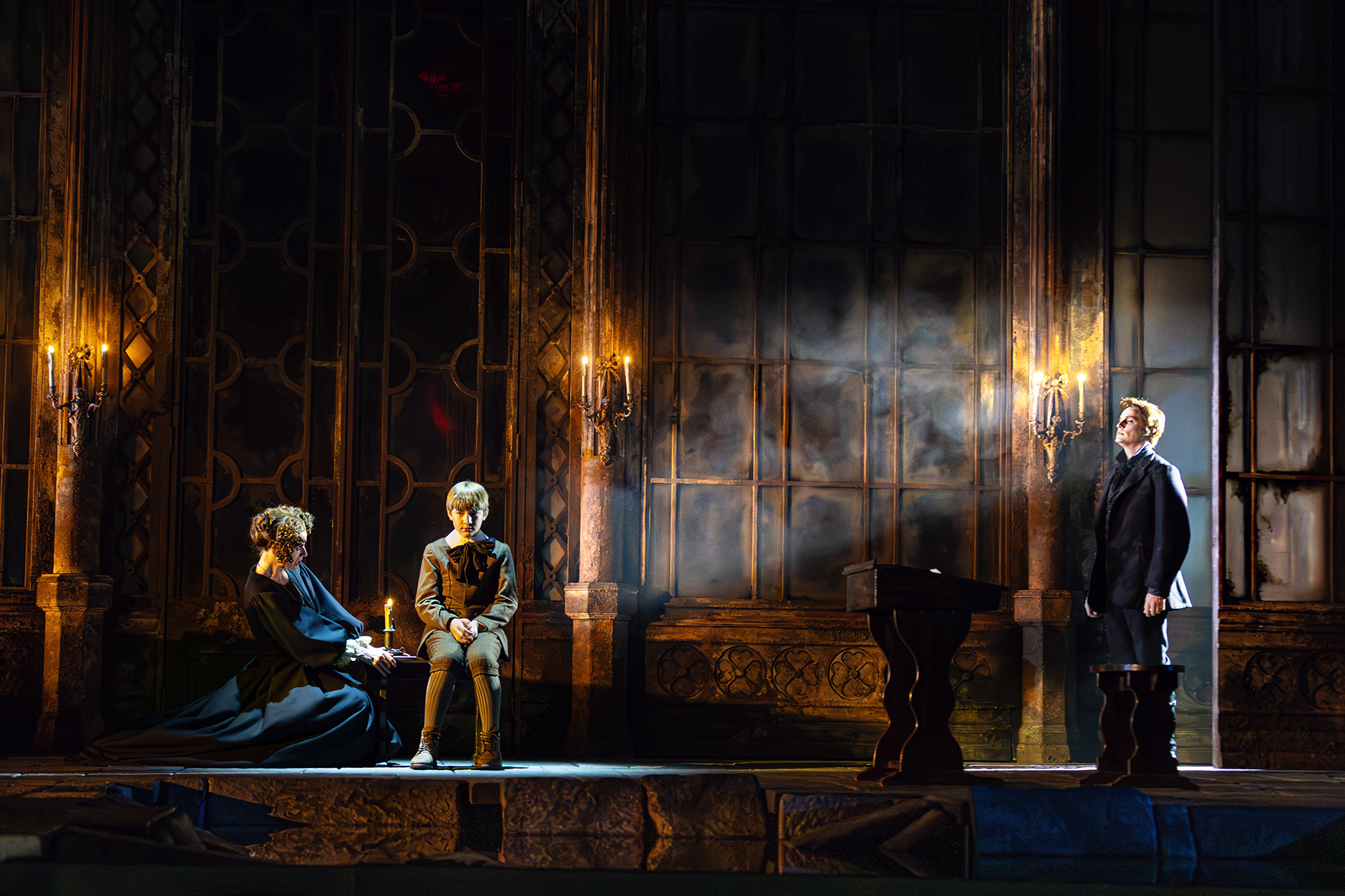 Jacquelyn Stucker (The Governess), Everett Baumgarten (Miles), Brenton Ryan (Peter Quint), photo by Curtis Brown for the Santa Fe Opera