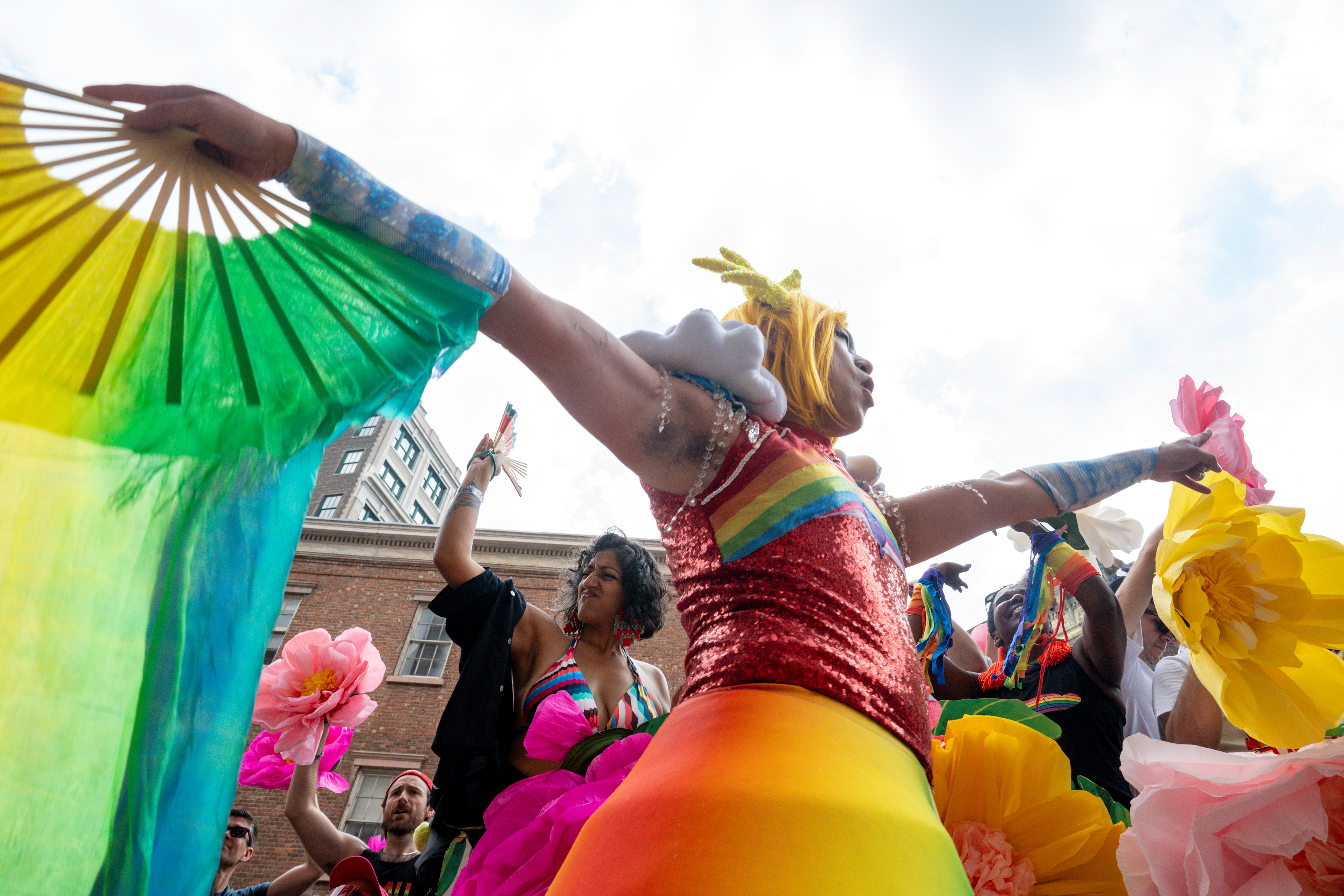 A person on stilts walks along with a float at NYC Pride in New York, NY, USA on June 28, 2026.