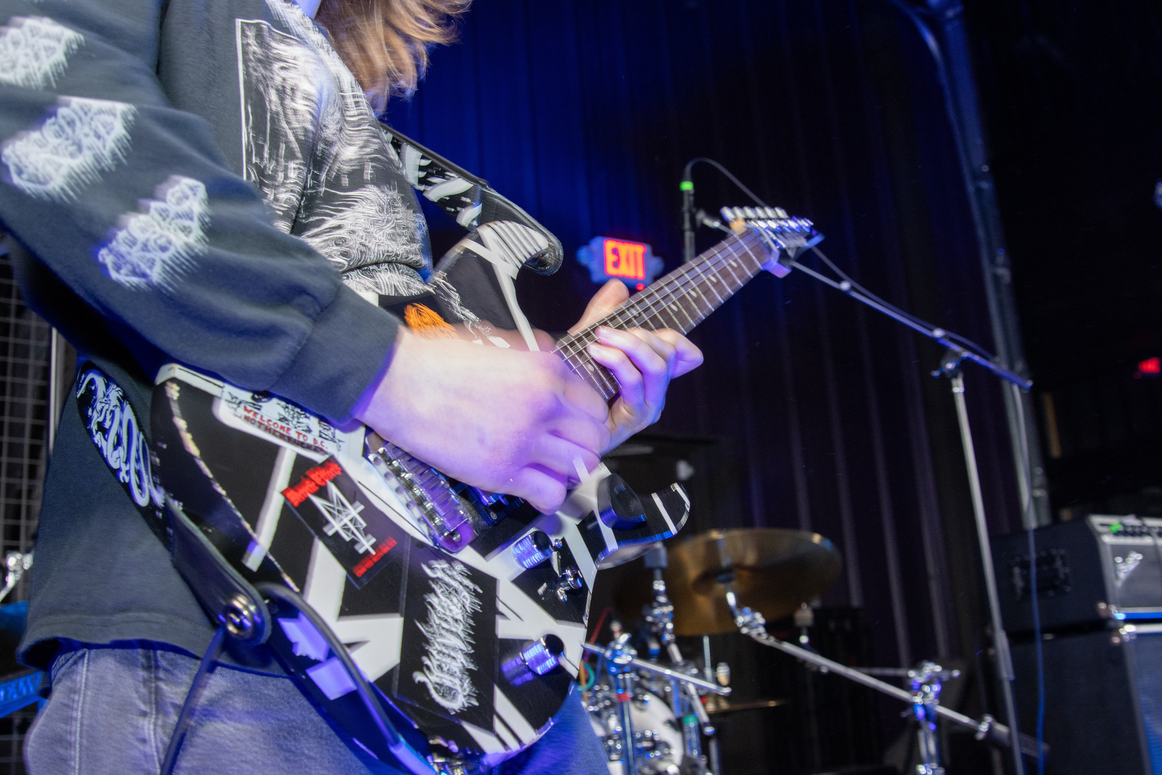 An Underserene guitarist performs at Shellfest II on Dec. 7, 2025.