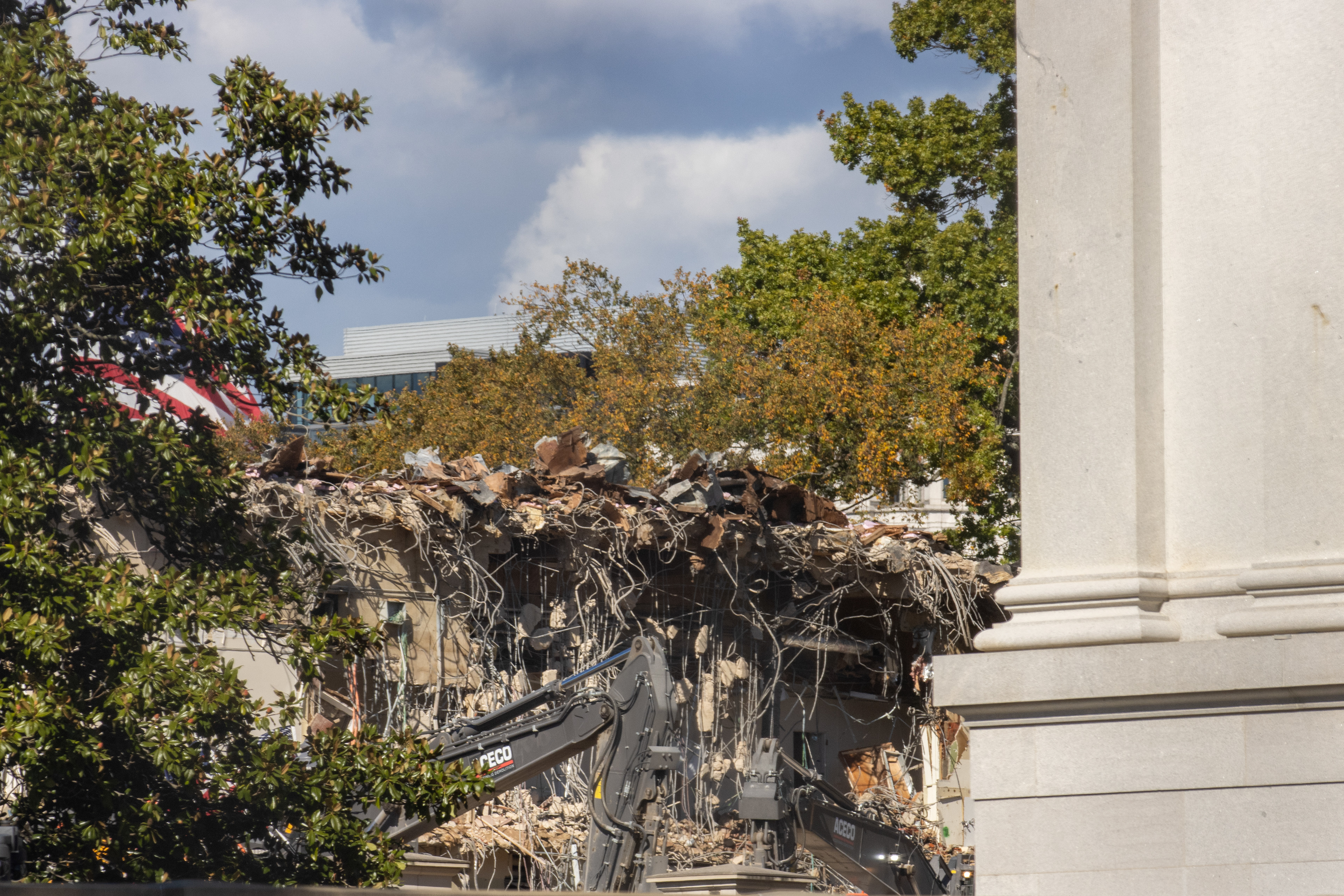WASHINGTON - A backhoe demolishes a part of the White House's East Wing on Oct. 22, 2025.