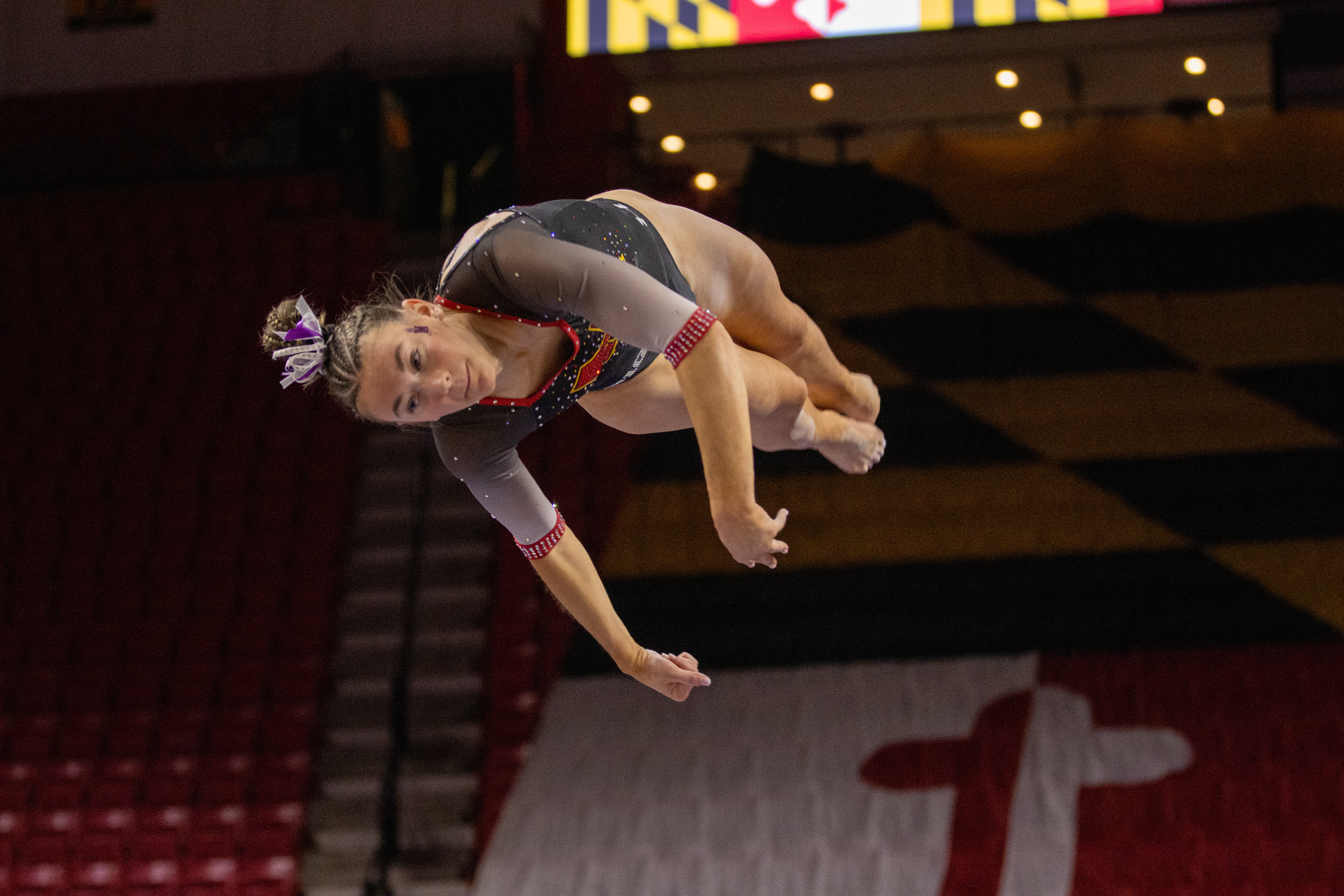 Rayna Engelmayer completes a beam dismount during Maryland gymnastics' 195.750-194.725 win over Iowa on Feb. 21, 2025.