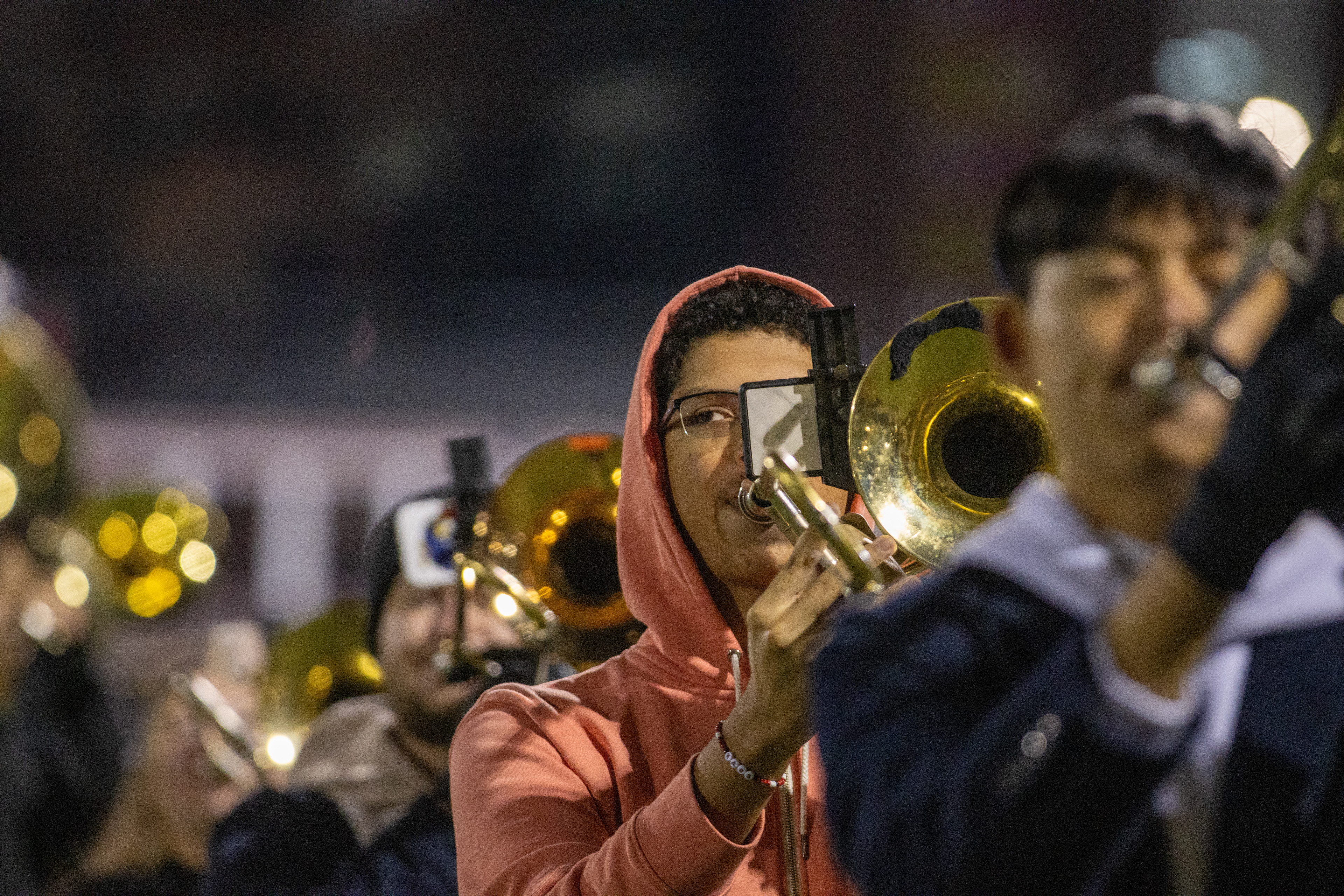 A member of the Mighty Sound of Maryland plays the trombone during rehearsal on the varsity turf on Nov. 12, 2024.
