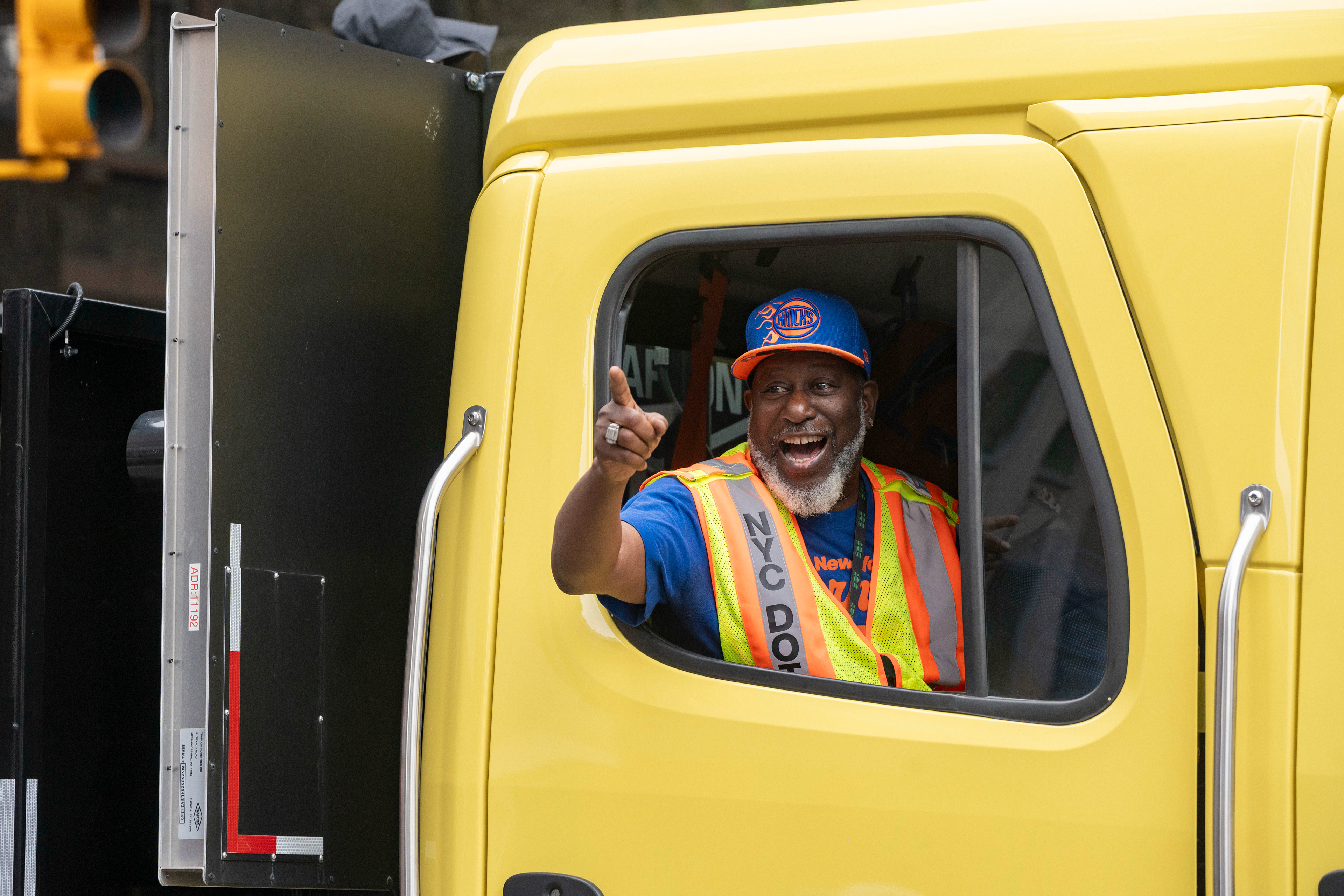 A participant cheers and points at the New York Knicks championship parade in New York City, NY, USA on Jun 18, 2026.
