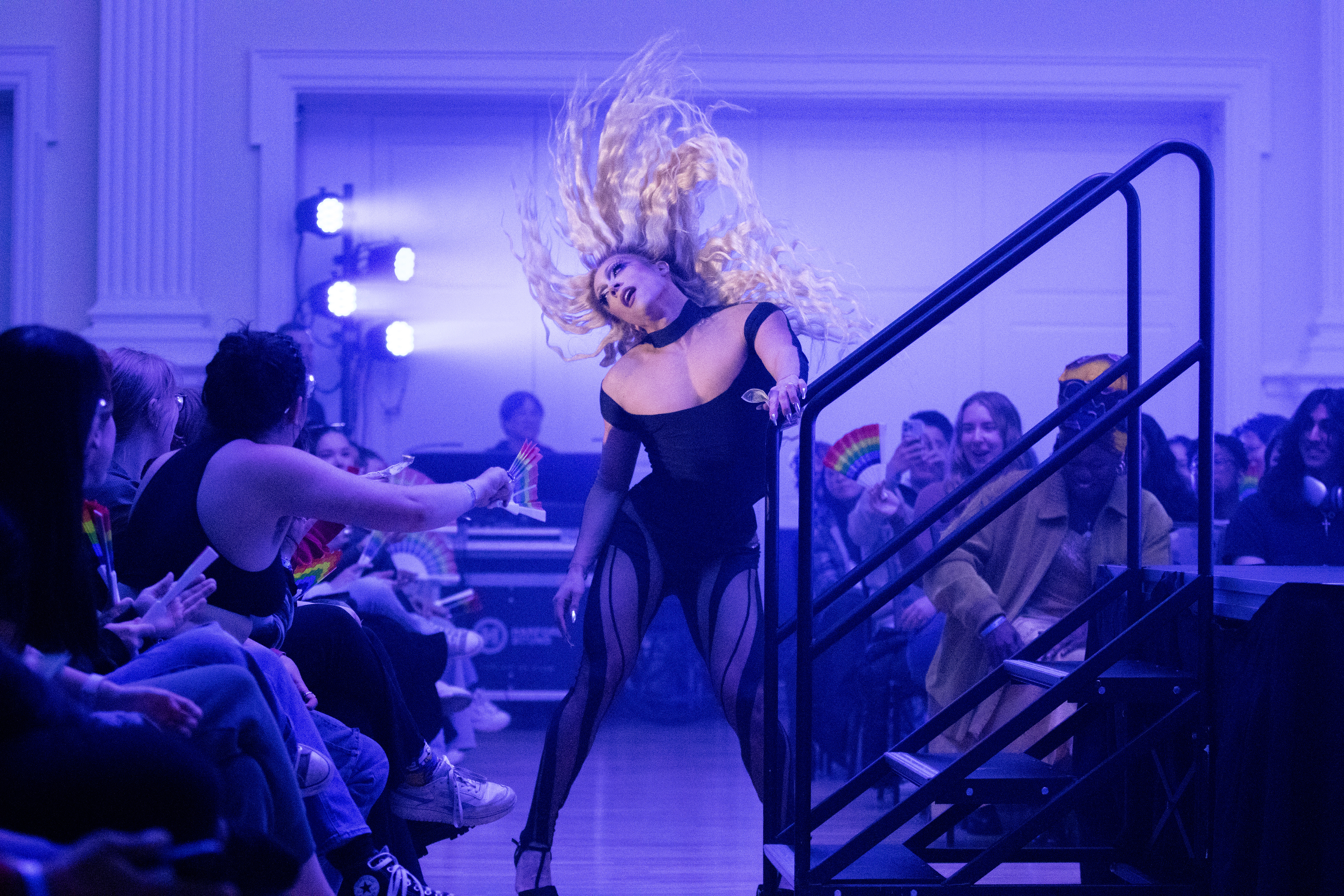 Denali Foxx’s hair flips while performing at SEE’s annual drag show on April 10, 2025 in Stamp Student Union. (Sam Cohen/The Diamondback)