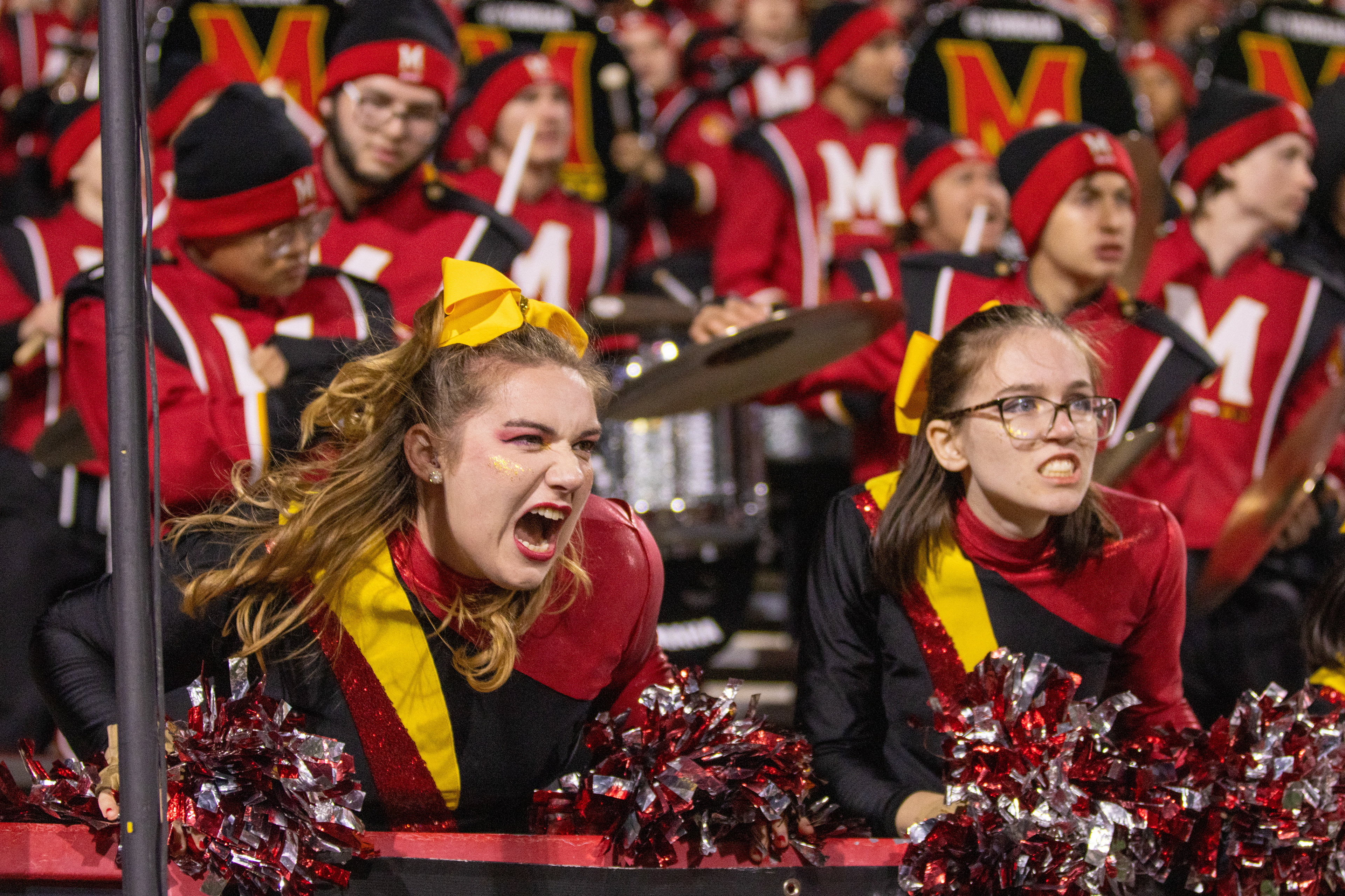 Members of the Mighty Sound of Maryland's Color Guard yell during Maryland football's 31-17 loss against Rutgers on Nov. 16, 2024. 