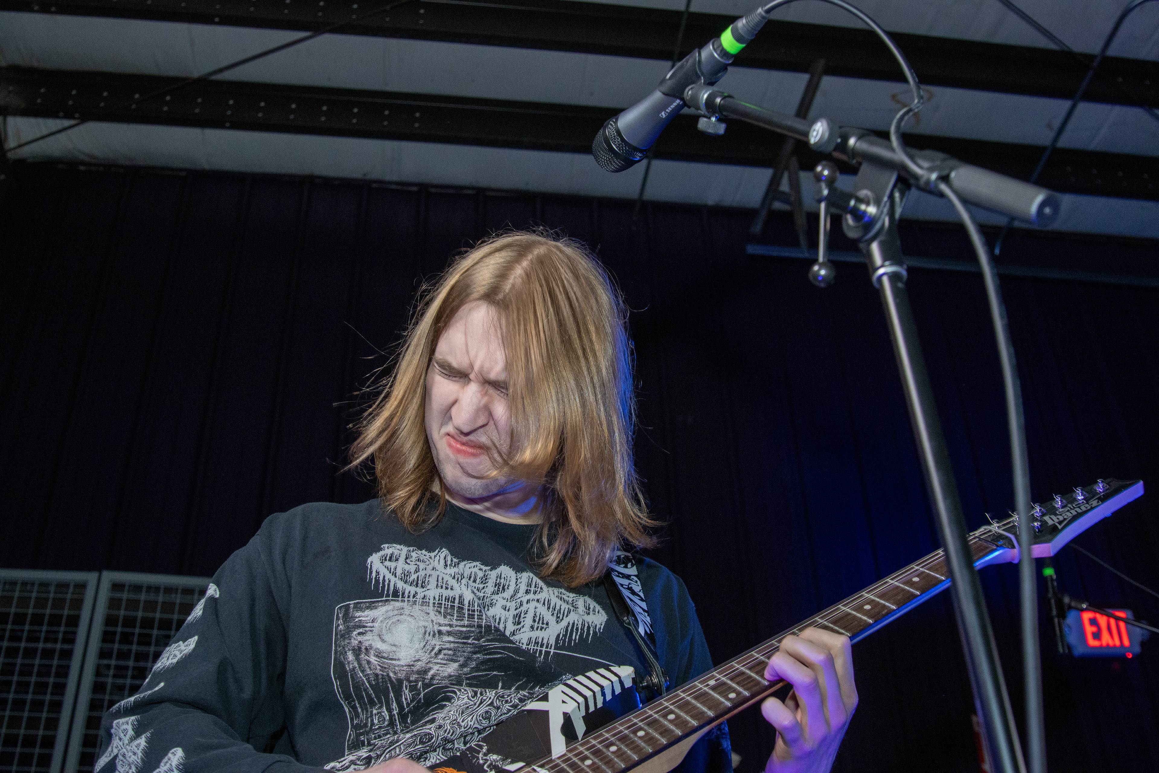 An Underserene guitarist performs at Shellfest II on Dec. 7, 2025.