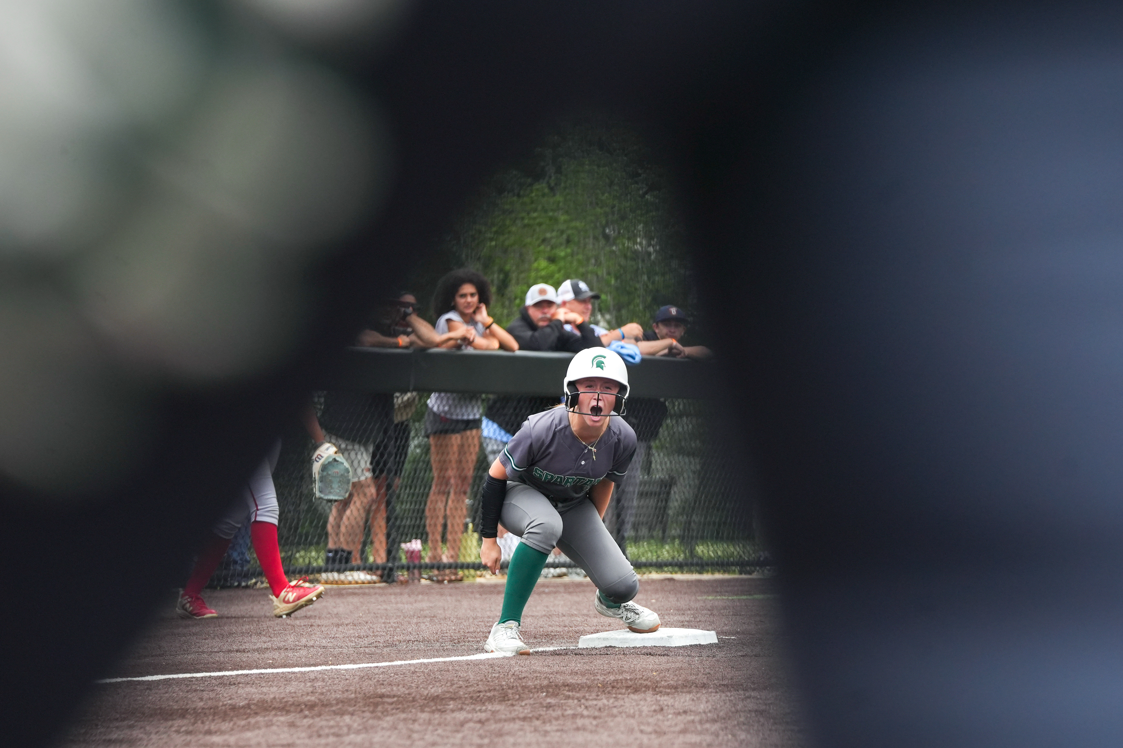 DePaul junior Abby Kiem (3) cheers on third base during the state championship game on Jun 10, 2026 at Seton Hall University in South Orange.