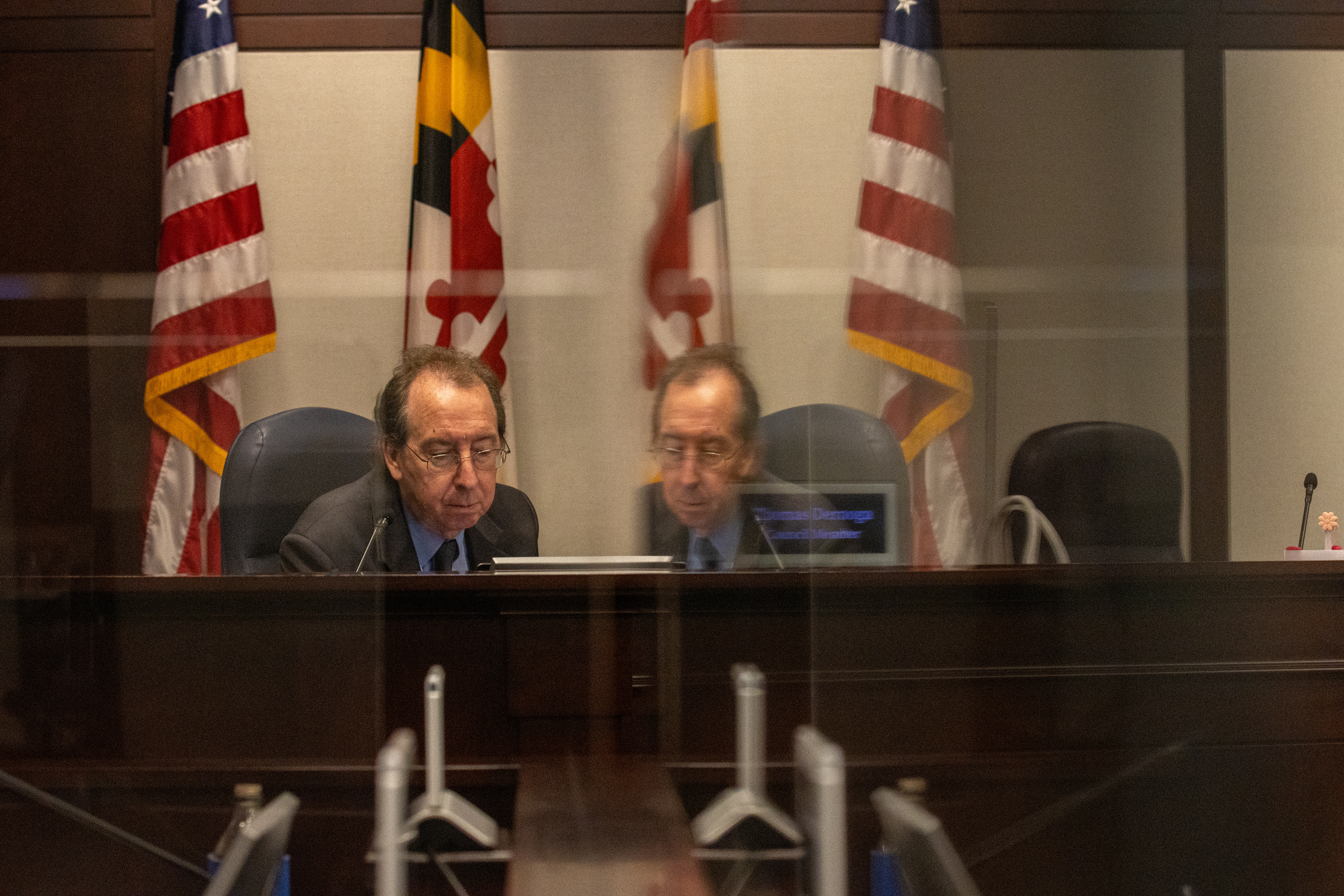 District 1 Prince George’s County Council member Thomas Dernoga looks down during a council meeting on Oct. 14, 2025.
