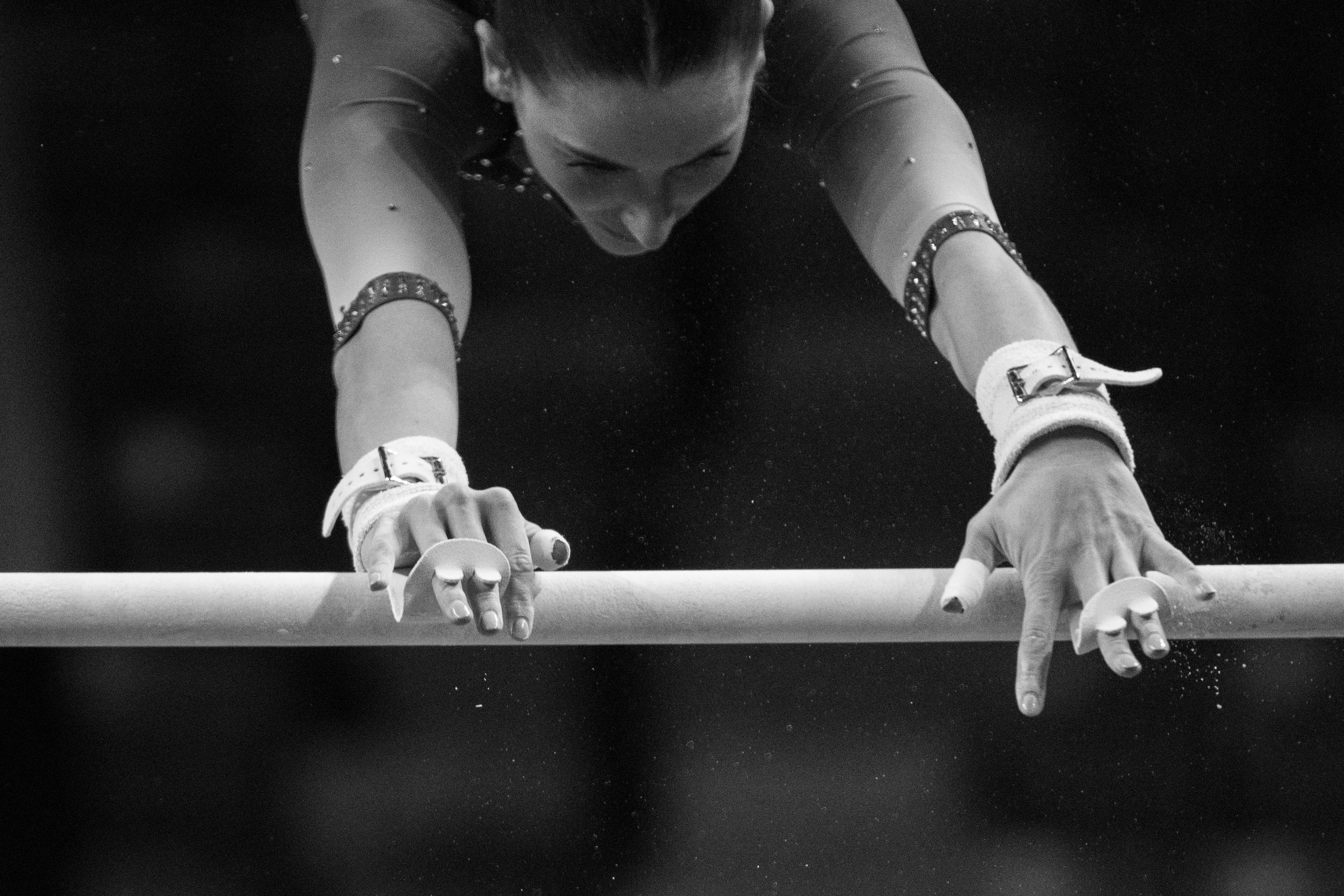 A gymnast warms up her bar routine during Maryland's 195.750-194.725 win over Iowa on Feb. 21, 2025.