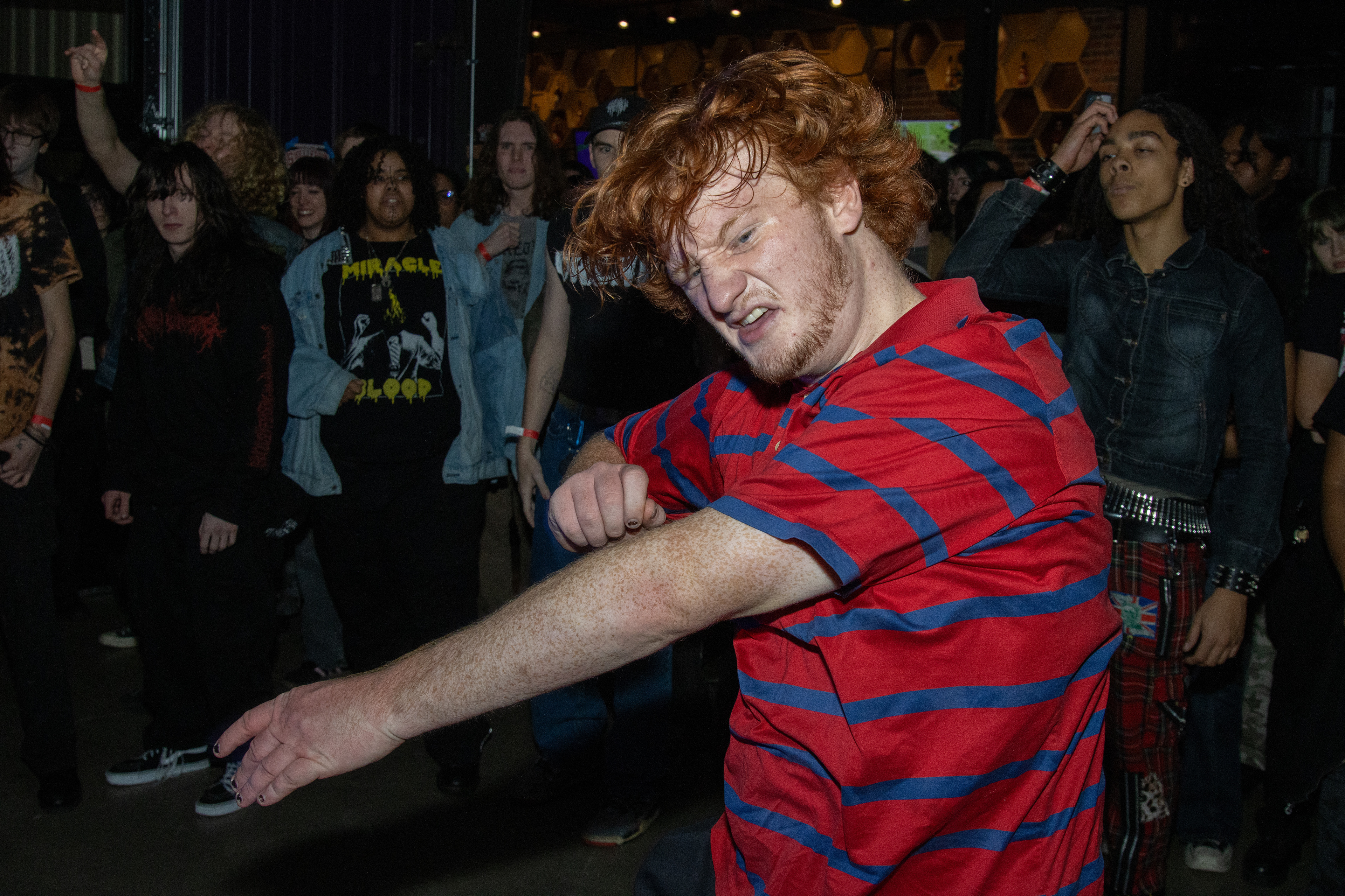 A Shellfest attendee moshes at Clear Skies Meadery on Dec. 7, 2025.
