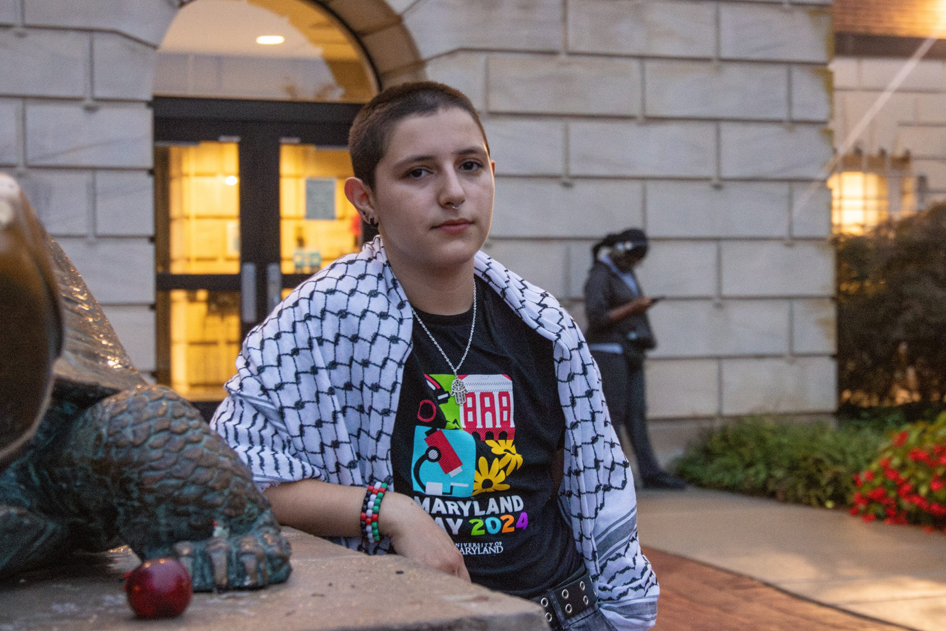Rifka Handelman, a senior environmental science and policy major and president of this university’s Jewish Voice for Peace chapter, poses for a portrait by Testudo outside of McKeldin Library on Sept. 25, 2024.