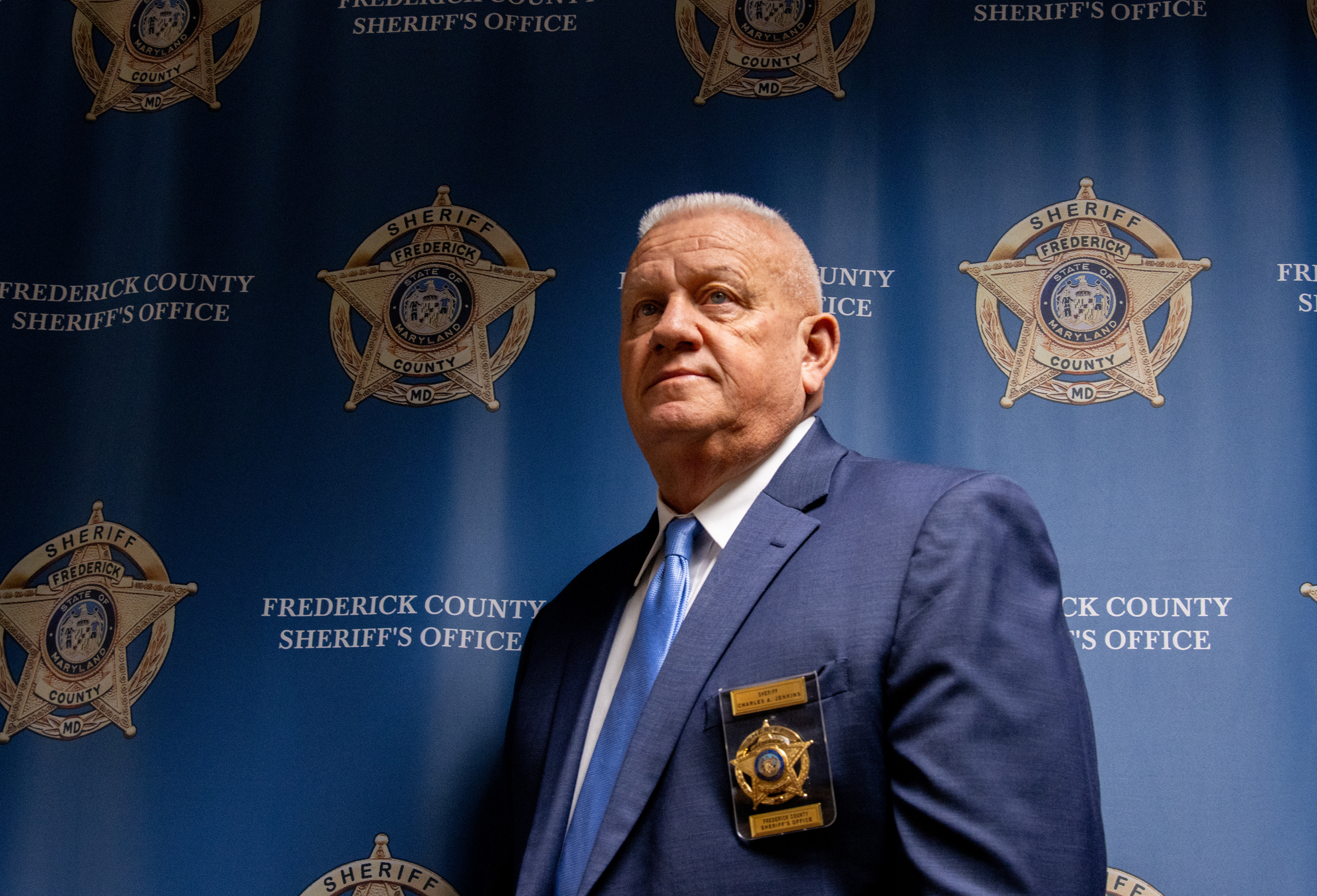 Frederick County Sheriff Chuck Jenkins poses for a portrait inside his office on Nov. 17, 2025. Jenkins is a strong supporter of the 287(g) program, an initiative that allows local law enforcement entities to enter partnership with Immigrations and Customs Enforcement and deport undocumented immigrants. The program is controversial in Maryland, a state typically known for its mostly progressive leaders and policies. 