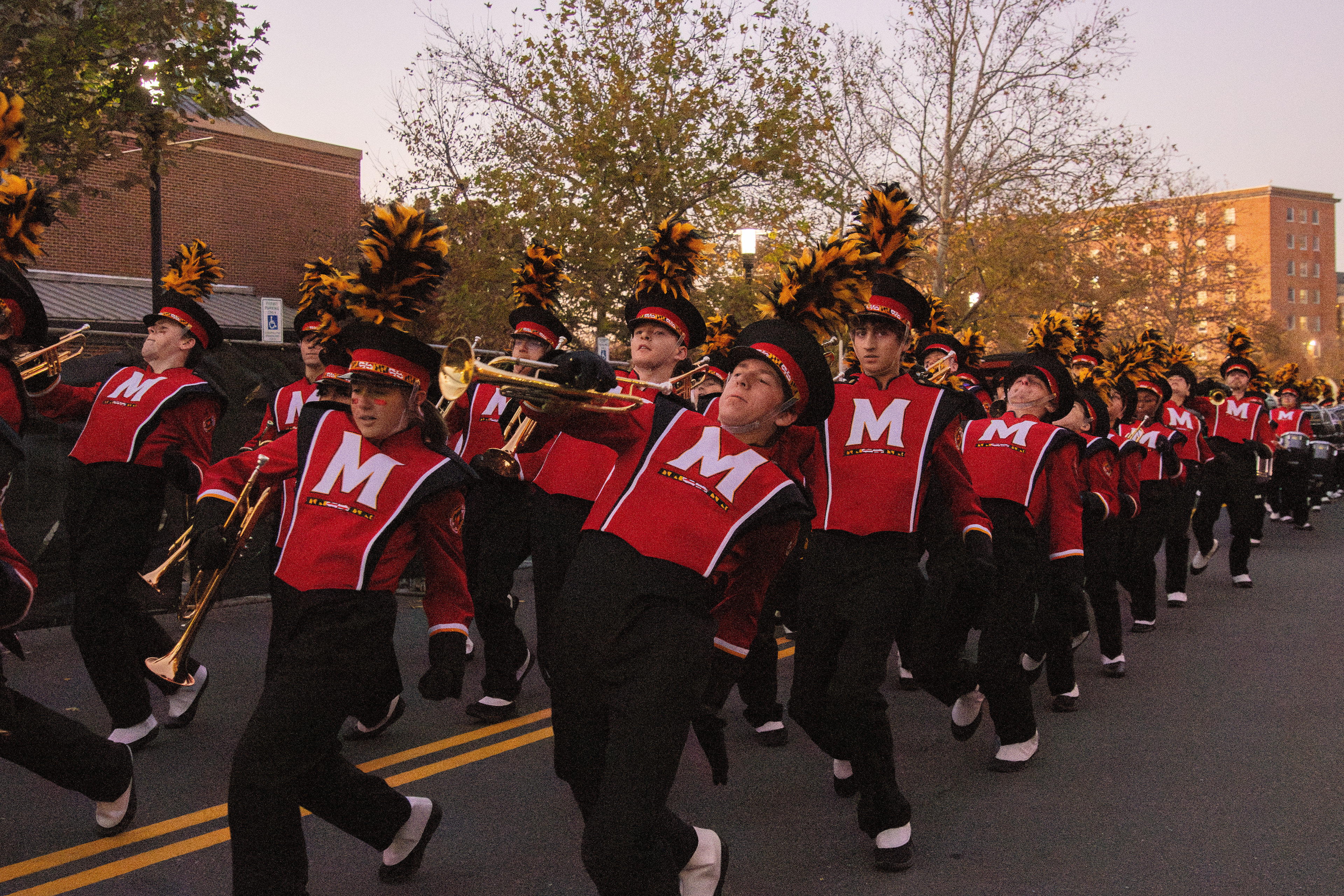 Members of the Mighty Sound of Maryland parade down Alumni Drive on Nov. 16, 2024. 