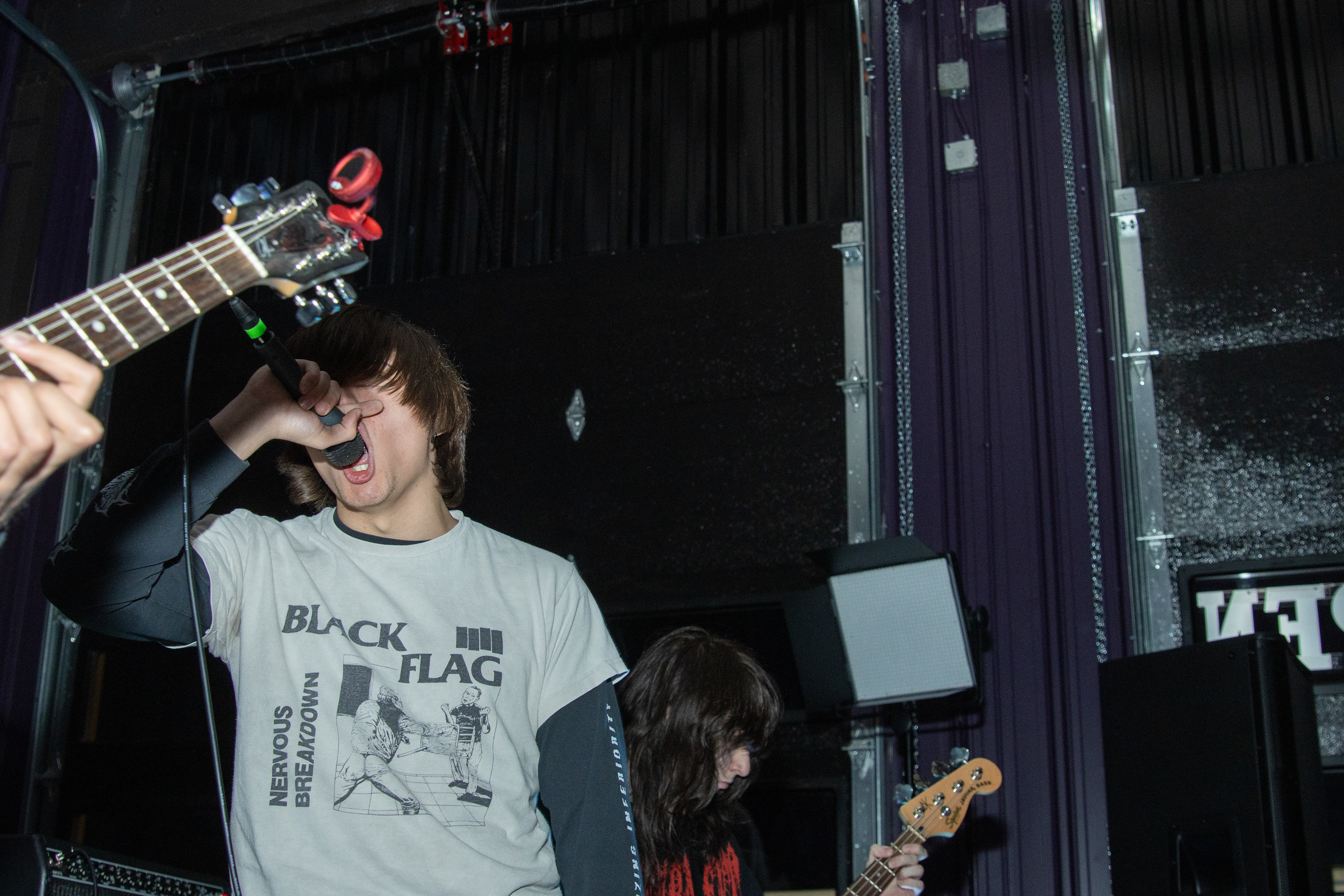 Slag Dump vocalist performs at Shellfest II on Dec. 7, 2025.