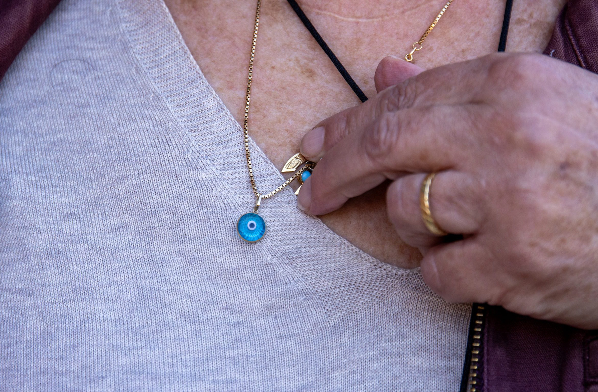 Nadine Sahyoun, a Palestinian American professor of nutrition and food science, wears a naẓar necklace on Nov. 12, 2024.