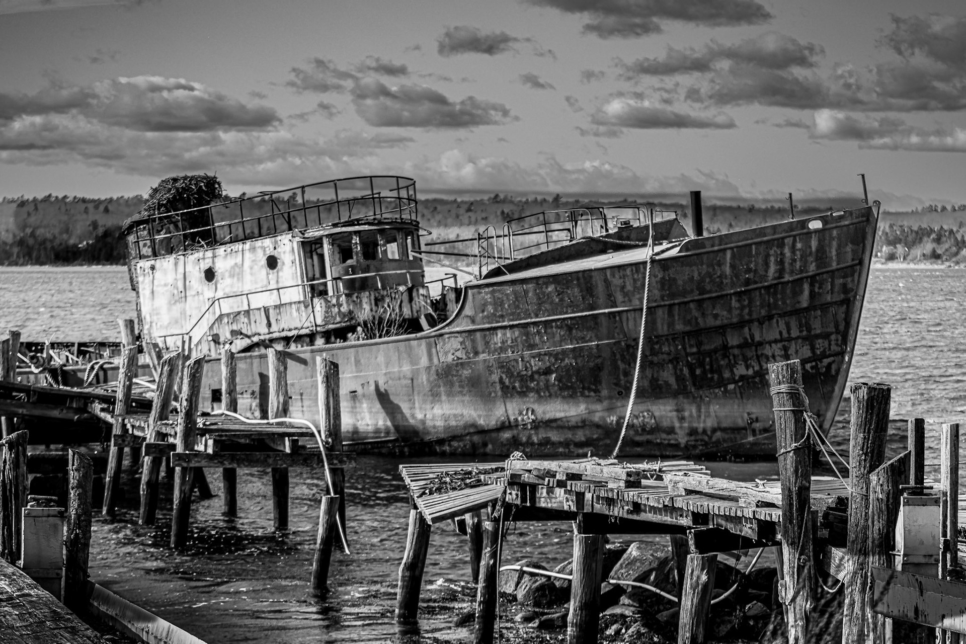 Morse Cove in Penobscot Bay Maine. FV Squall was bought from the Coast Guard for $1 and beached circa 1974. Launched at Bath Iron Works 1937 as FV Tide. Commissioned in WW2 as YP-414 , serving in the South Pacific & Guadacanal. Renamed FV Squall.