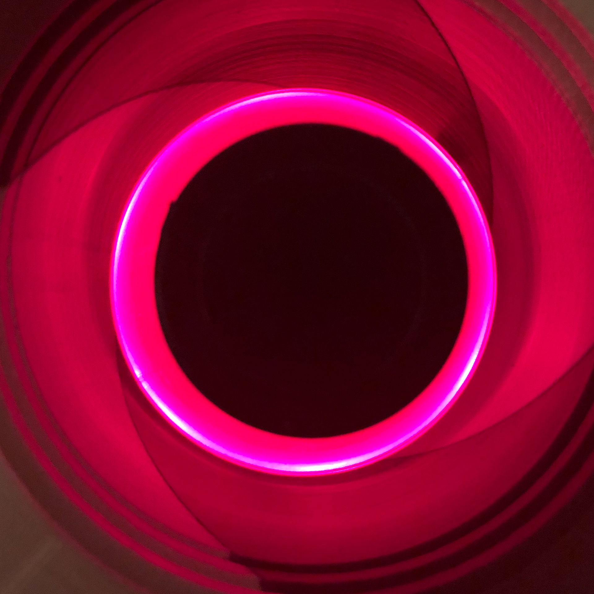 A view with the top off, with bottle inside