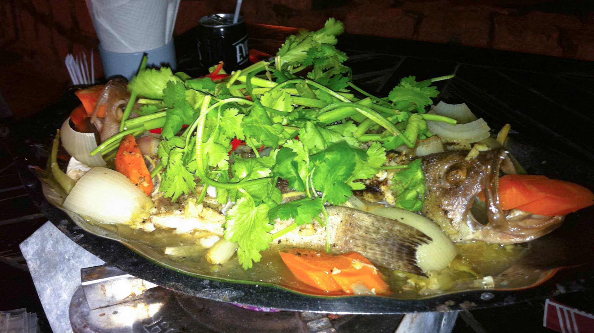 Two fish on platter waiting to be eaten, Ninh Thuan