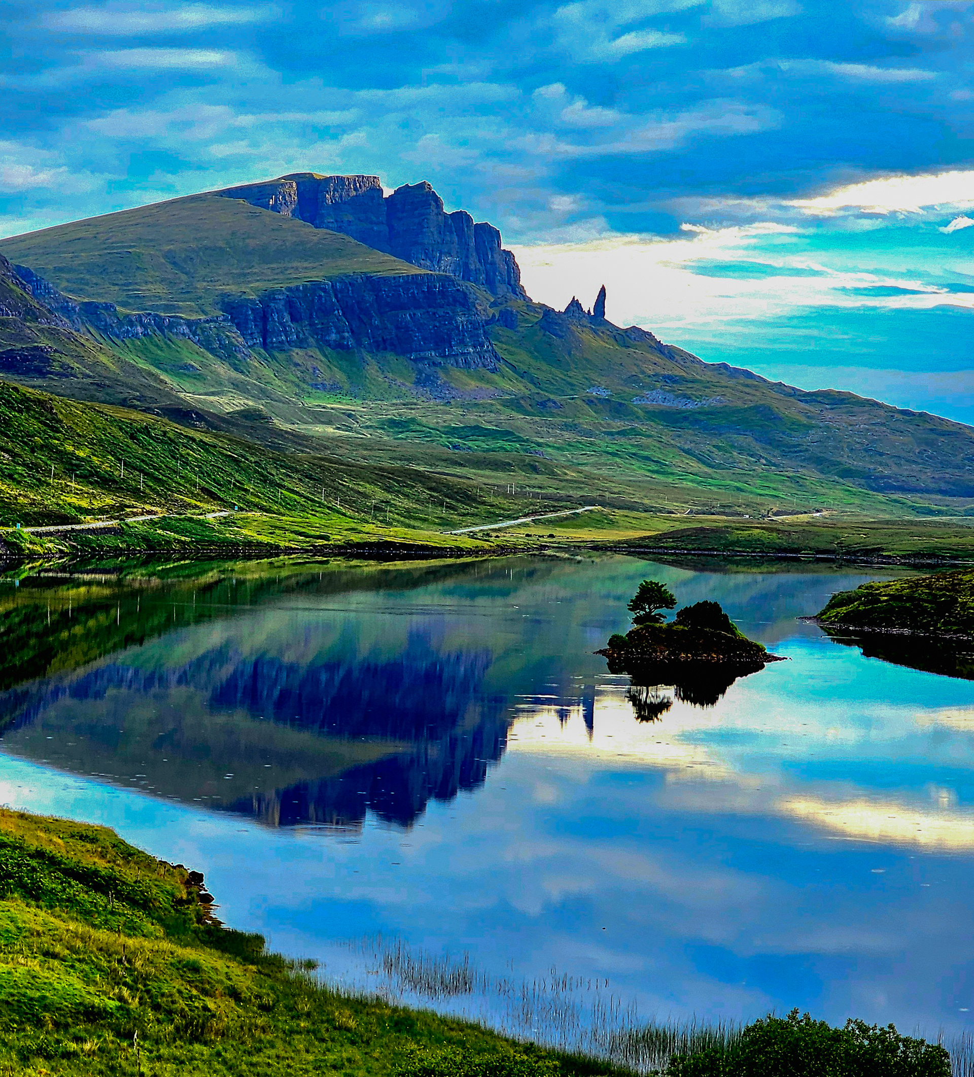 Cell phone image Man of Storr being reflected