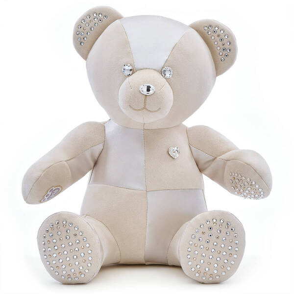 I designed the original Swarovski collectable plush.  It was a fun project to work on and the design is still being recolored and used. 