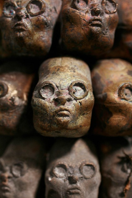 Invaders Must Die (detail), bronze, 117" x 12" x 12"