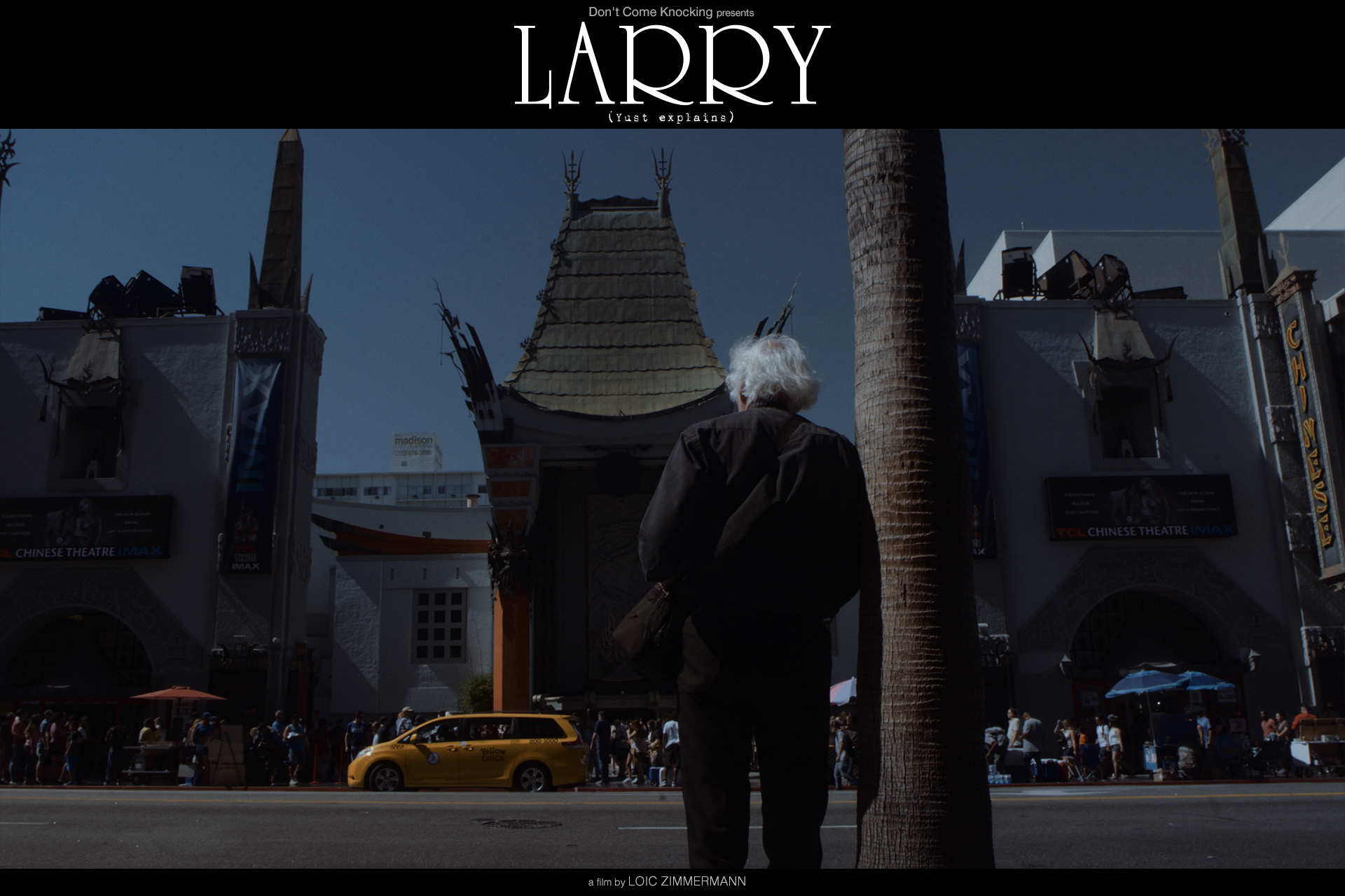 Larry in front of the Chinese Theater after a long walk down Hollywood blvd.