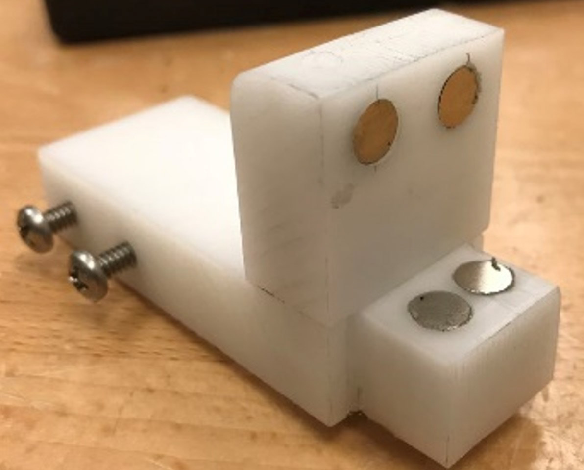 Magnetic attachment of x and z slide to allow for easy assembly