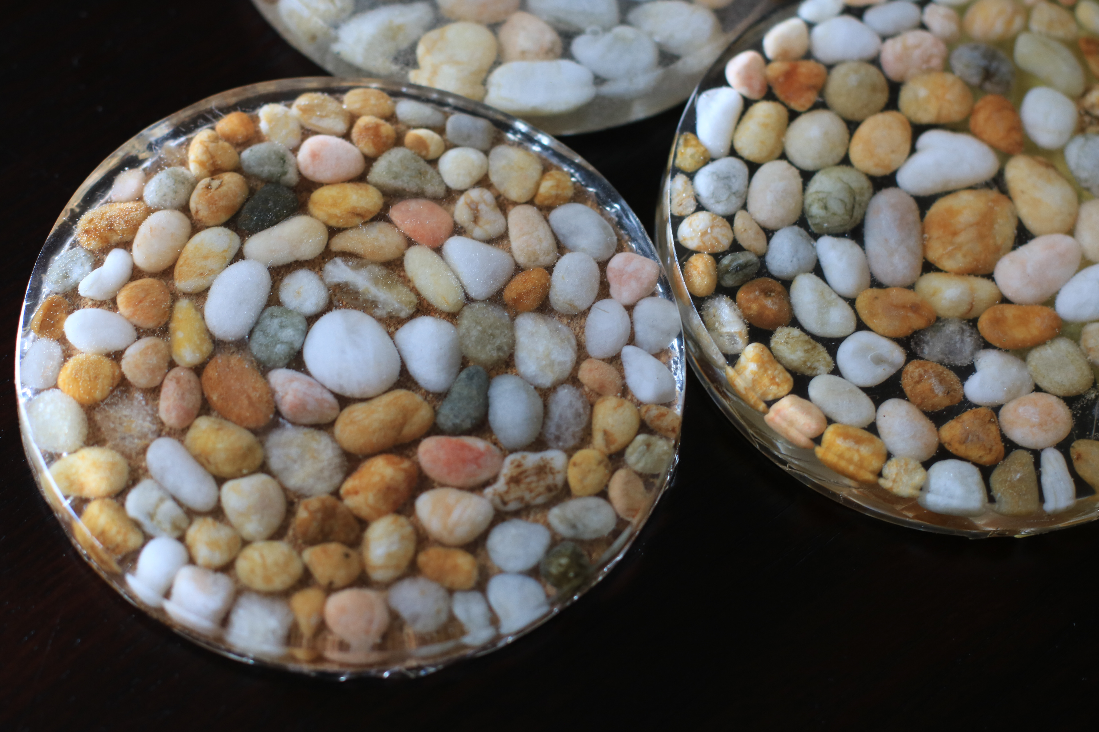 Epoxy coasters made from collected NJ beach rocks