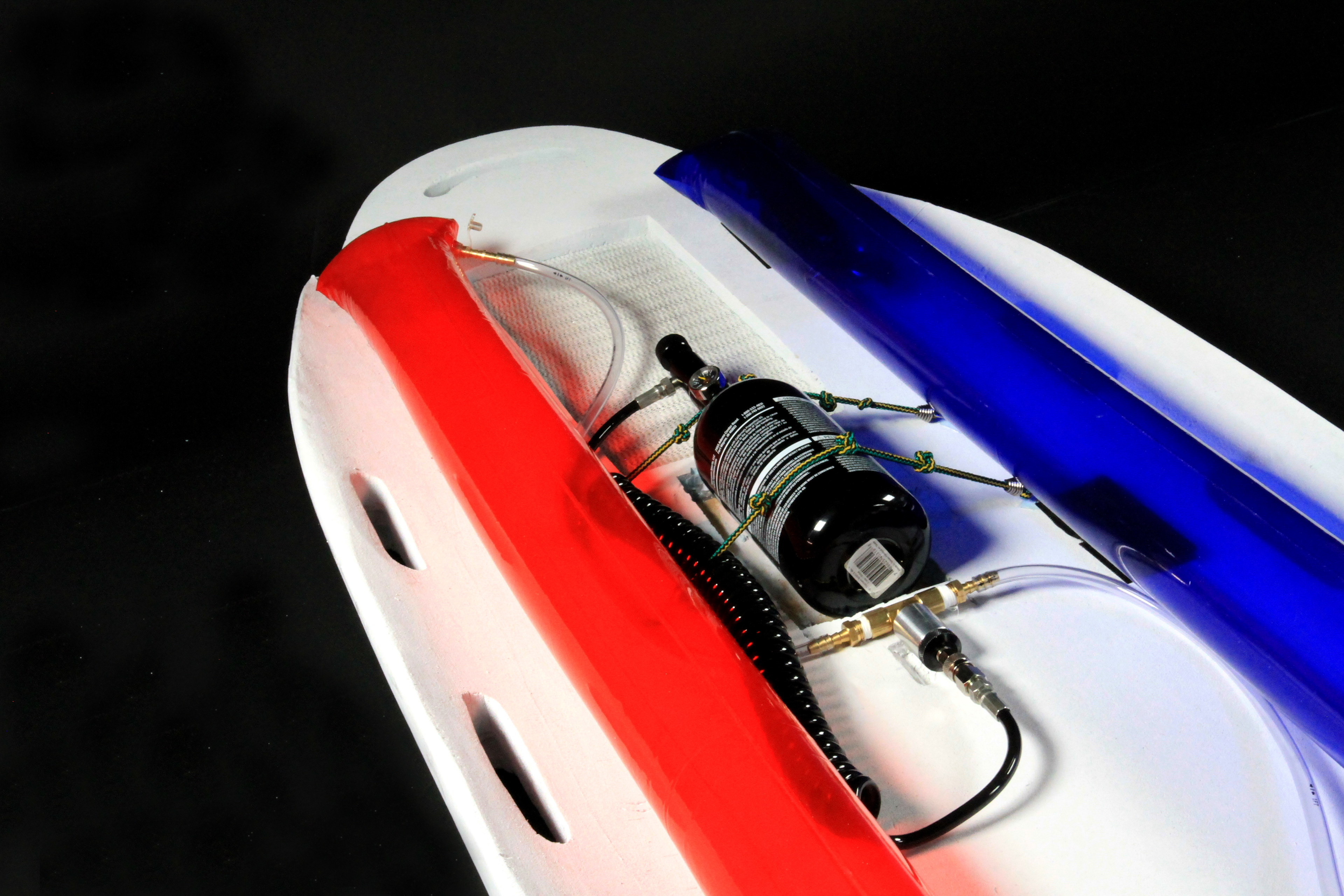 Air canister allows for underwater inflation of the tubes