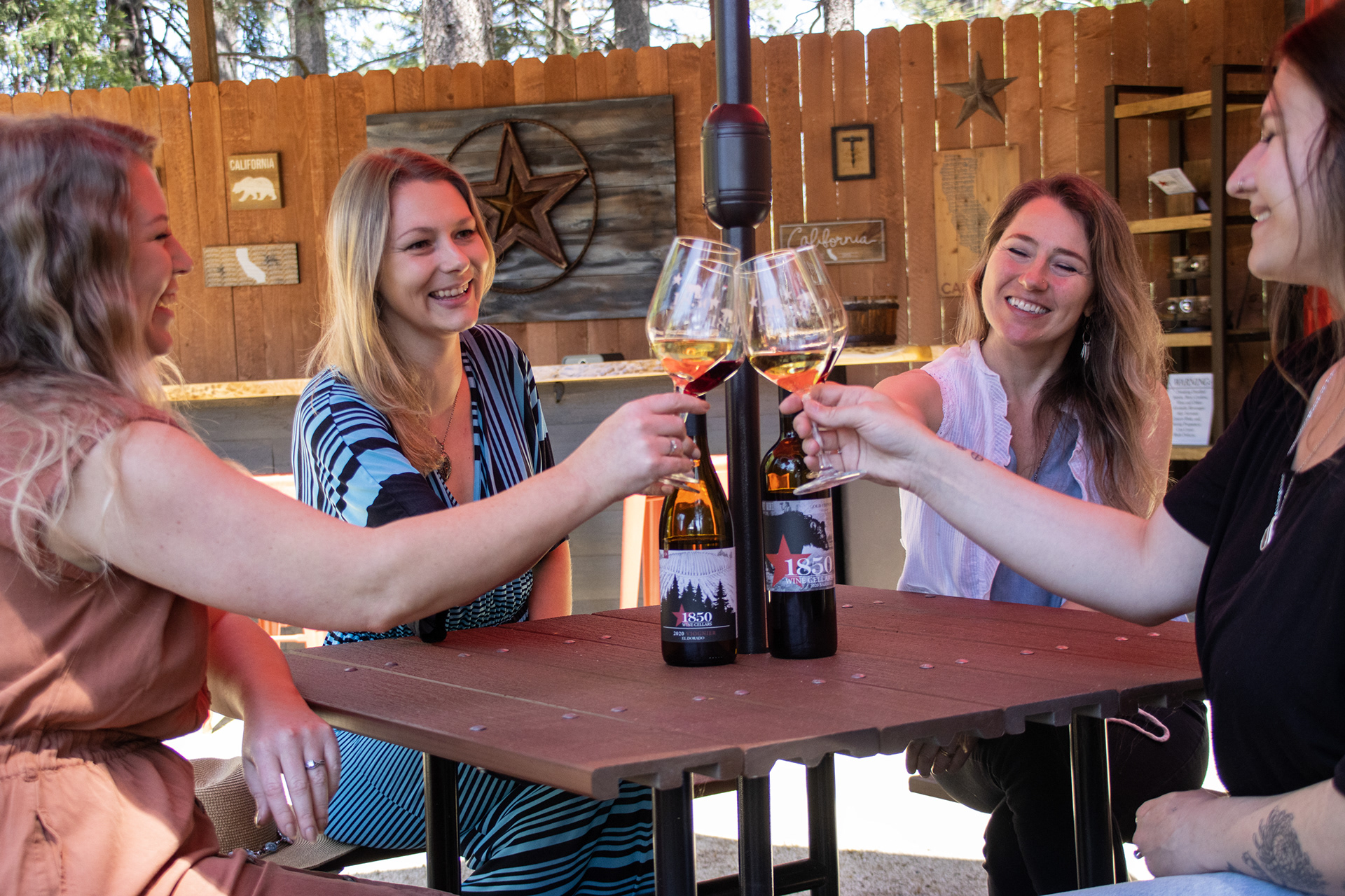People drinking wine and smiling