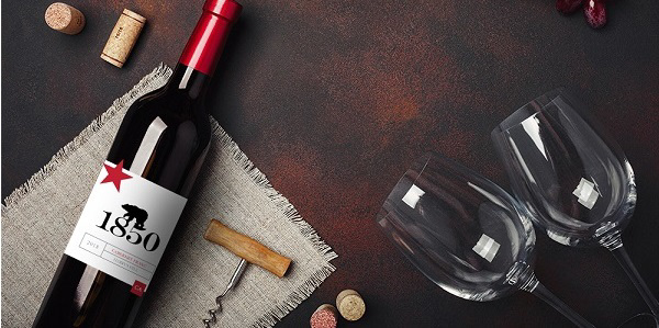 Bottle of wine with two glasses and corks