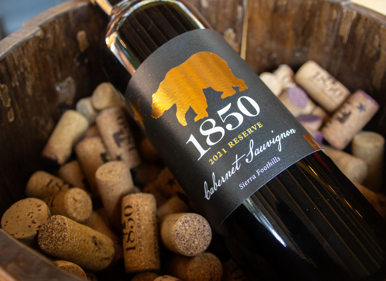 Bottle of wine laying in corks