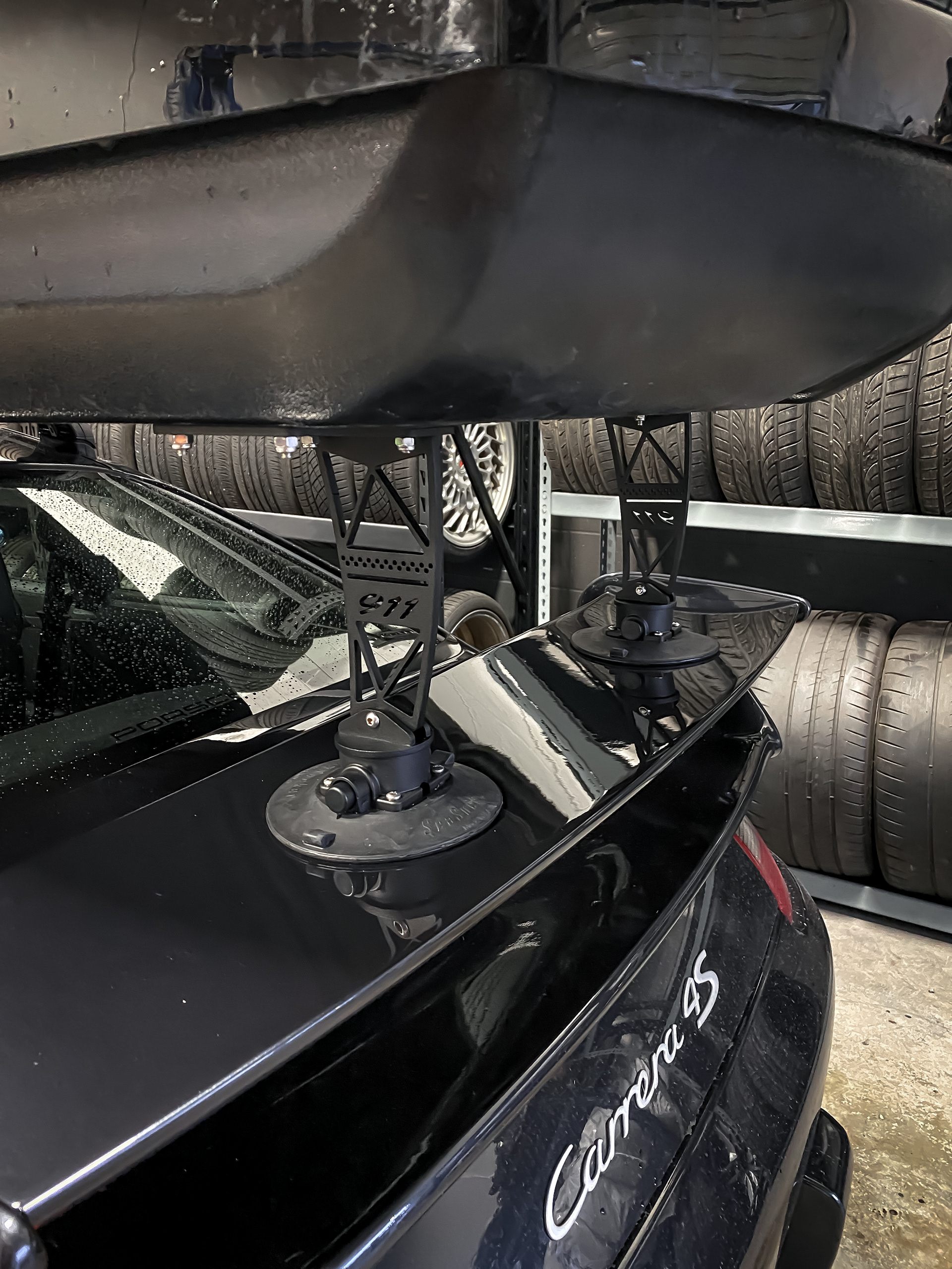 Porsche 911 Thule roof box mount installed.