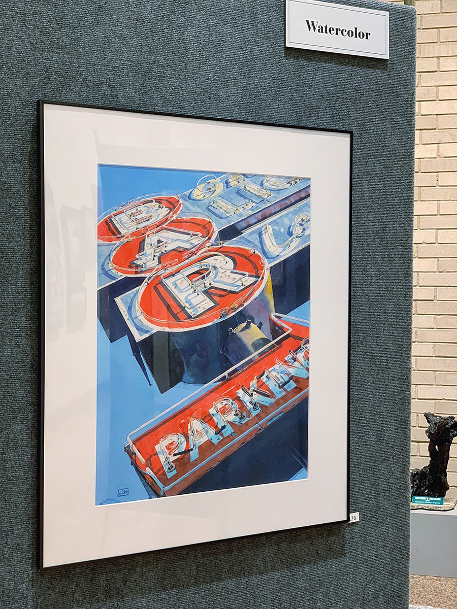 image of the framed painting of George's Tavern neon sign displayed on exhibition wall