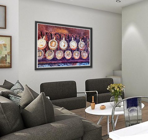 image of the cash register painting above two chairs in a living room
