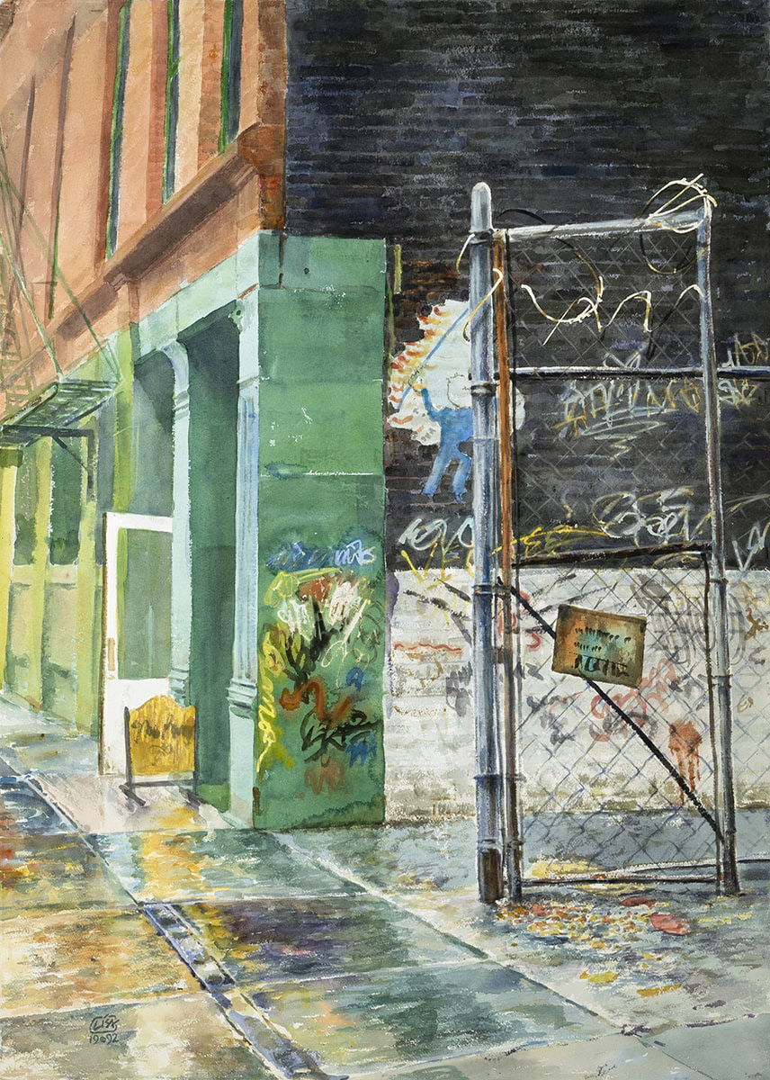 image of a building with graffiti painted on the side alley