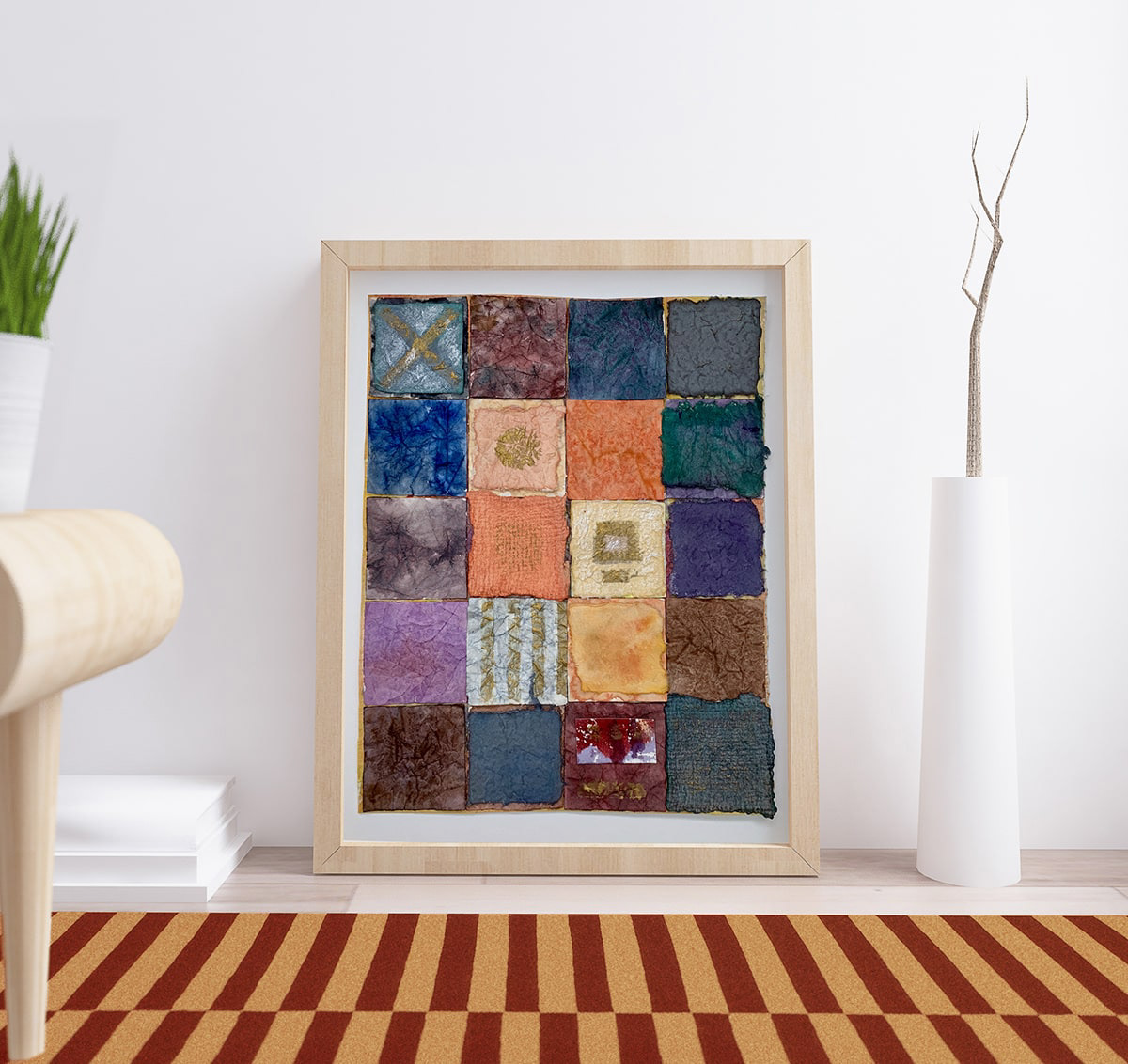 image of the color squares collage in a frame leaning against a wall