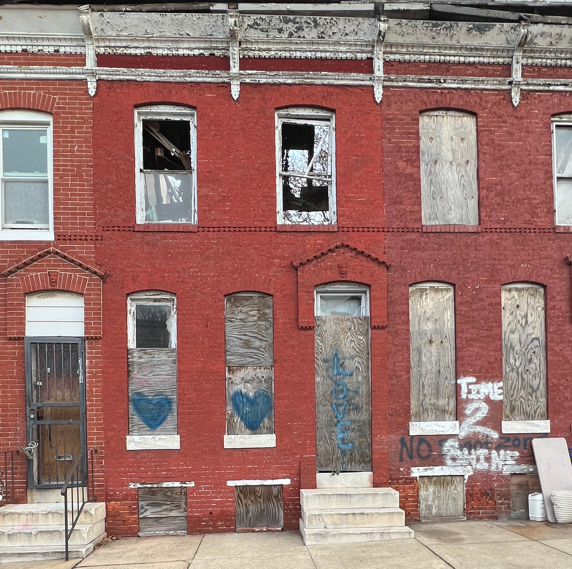 Pennslyvania Ave., Baltimore - Hearts, love and "Time to Shine".  Positive  in a desparate situation.