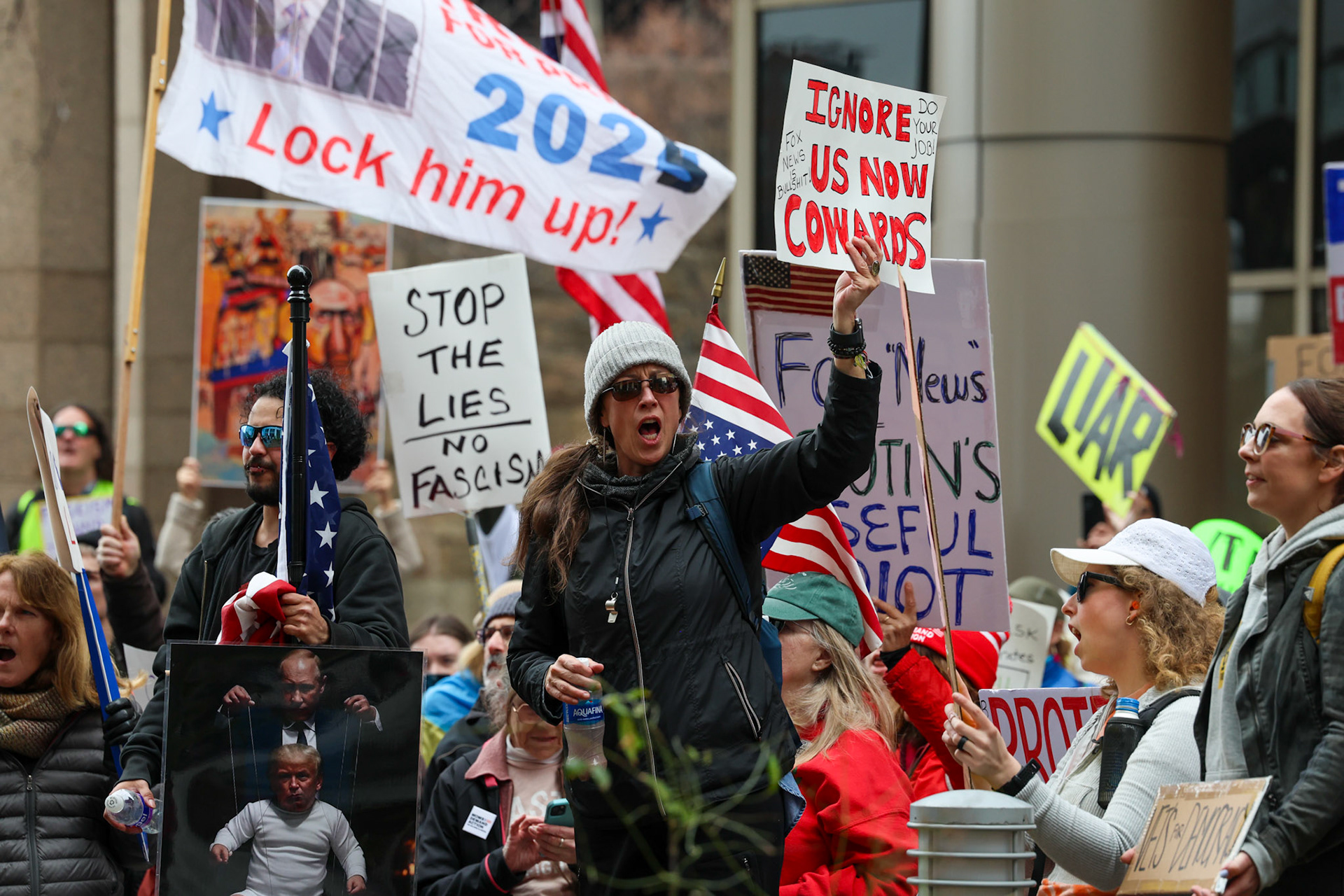 March 16, 2025, FOX News, NBC News and CNN, Washington, DC, USA. Members of the political activist group 50501 held a Media March in the Capital urging truth over propaganda. Photo Credit: Robyn Stevens Brody/Sipa USA.