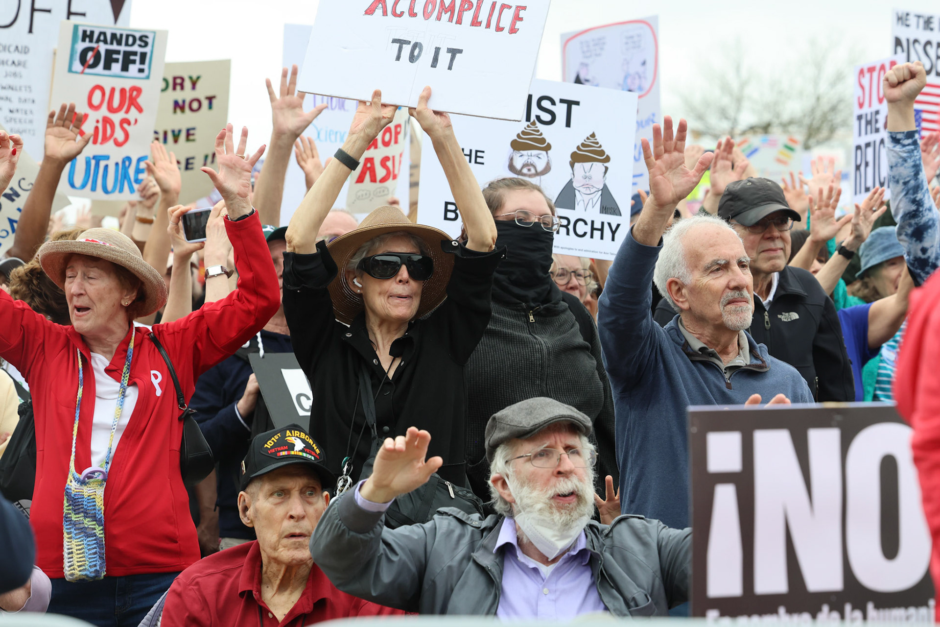 April 5, 2025, The National Mall, Washington, DC, USA.  Hundreds of Thousands of protesters across the nation protested against Donald Trump and Elon Musk.  The flagship protest was held in Washington D.C. Thousands of activists were rallying for democracy and against unconstitutional actions by the Trump Administration.  Photo Credit: Robyn Stevens Brody/Sipa USA.