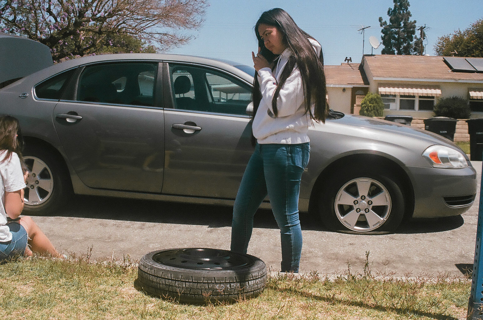 Kyli and her flat tire