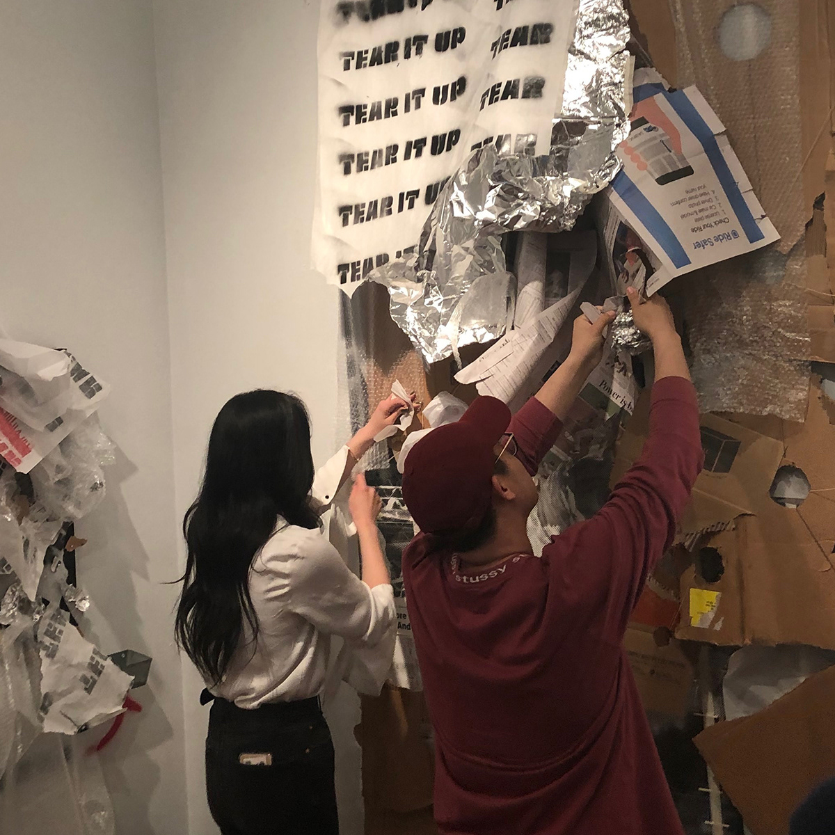 Fellow BU CFA students try out the installation themselves.