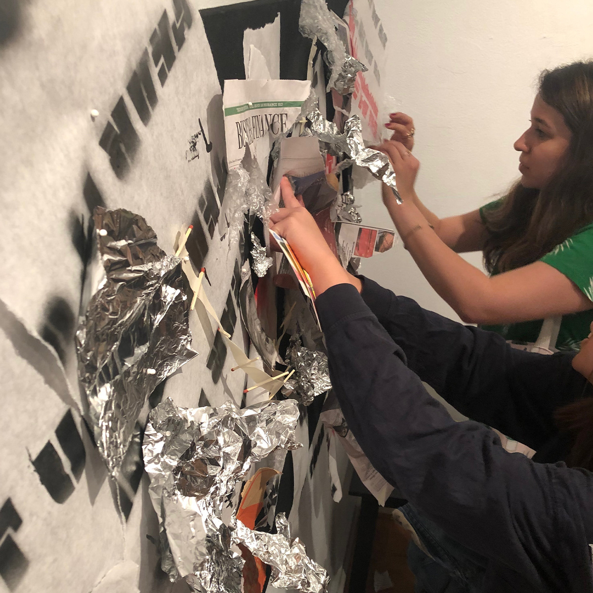 More participants interacting with the installation, adding their specimens to the collection.