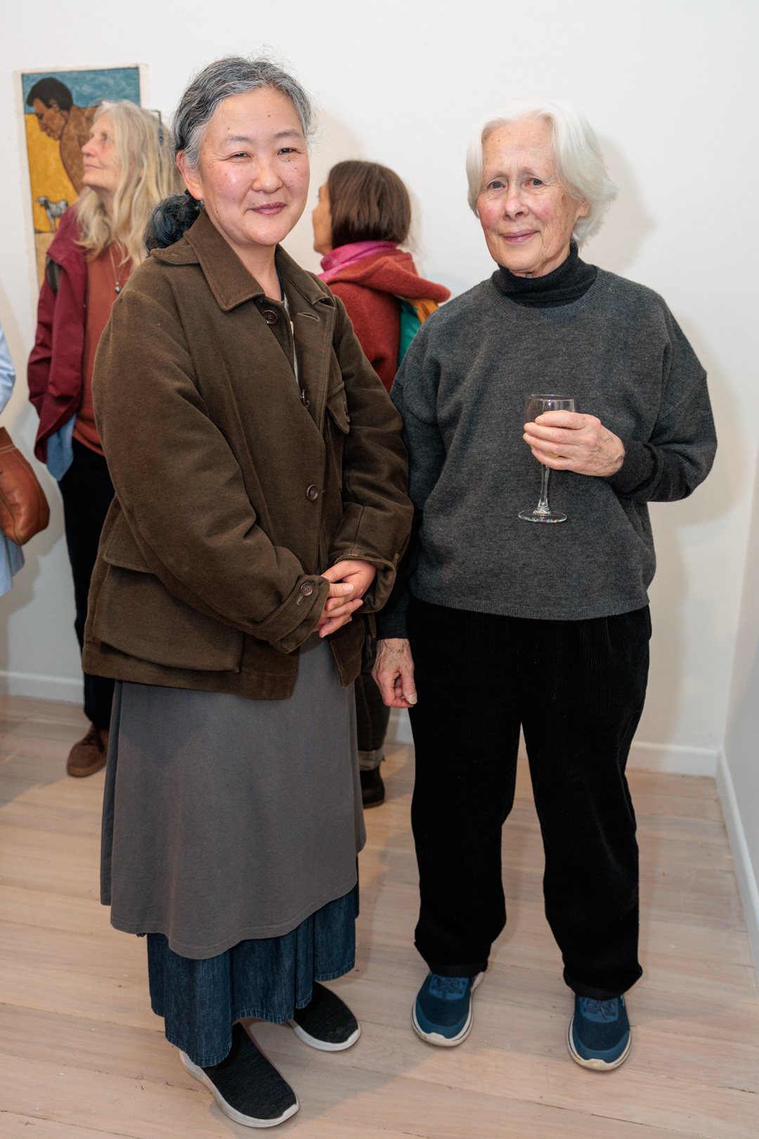 Dame Robyn White and an attendee at the exhibition opening.