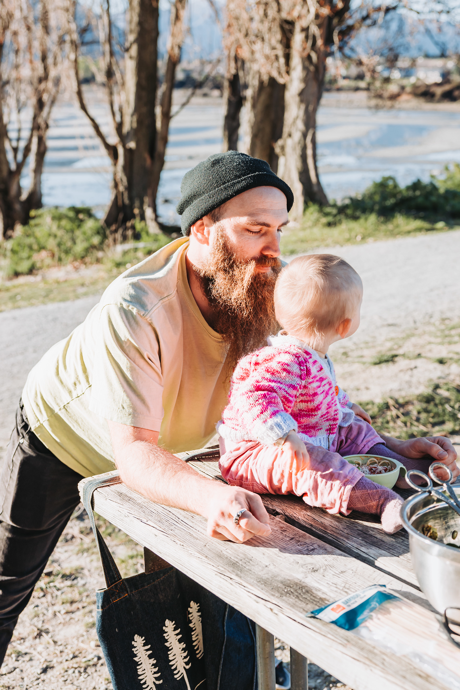 Nelson and Emma on the picnic tables at Lake Wanaka