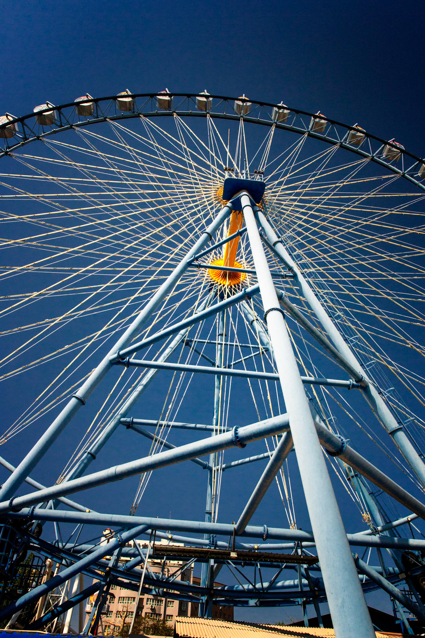 Kashgar,  China - September 10th, 2018 : View of a ferris wheel at a fair in Kashgar